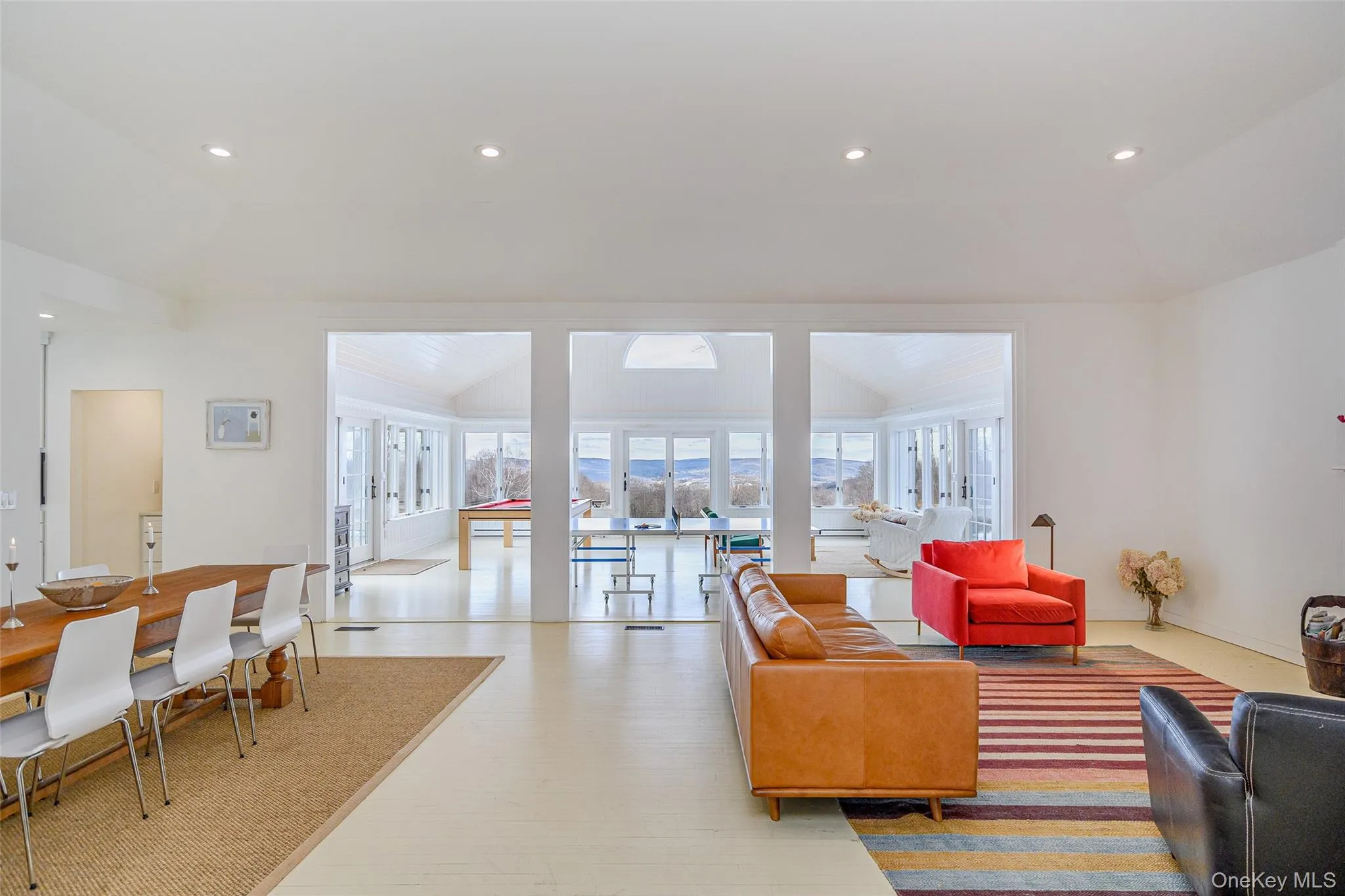 Living area featuring recessed lighting and vaulted ceiling Living area featuring recessed lighting and vaulted ceiling