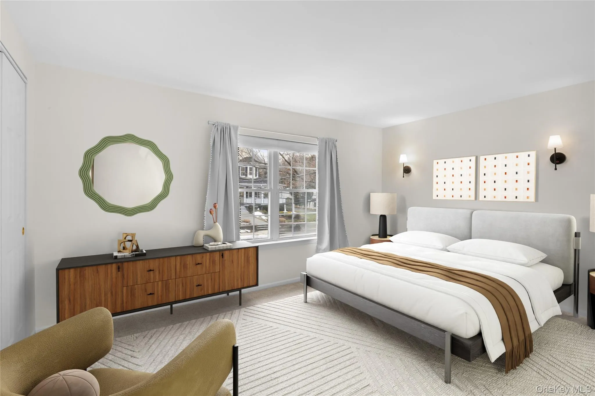 Bedroom featuring carpet and a closet/digitally staged Bedroom featuring carpet and a closet/digitally staged