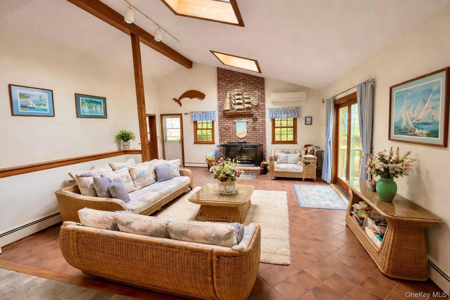Virtually enhanced, large open family room with fireplace and sliding glass doors leading out to the back deck. Virtually enhanced, large open family room with fireplace and sliding glass doors leading out to the back deck.