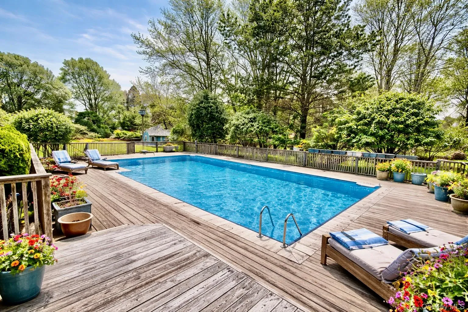 Virtually enhanced, Large in ground pool solar heated surrounded by large deck. Virtually enhanced, Large in ground pool solar heated surrounded by large deck.