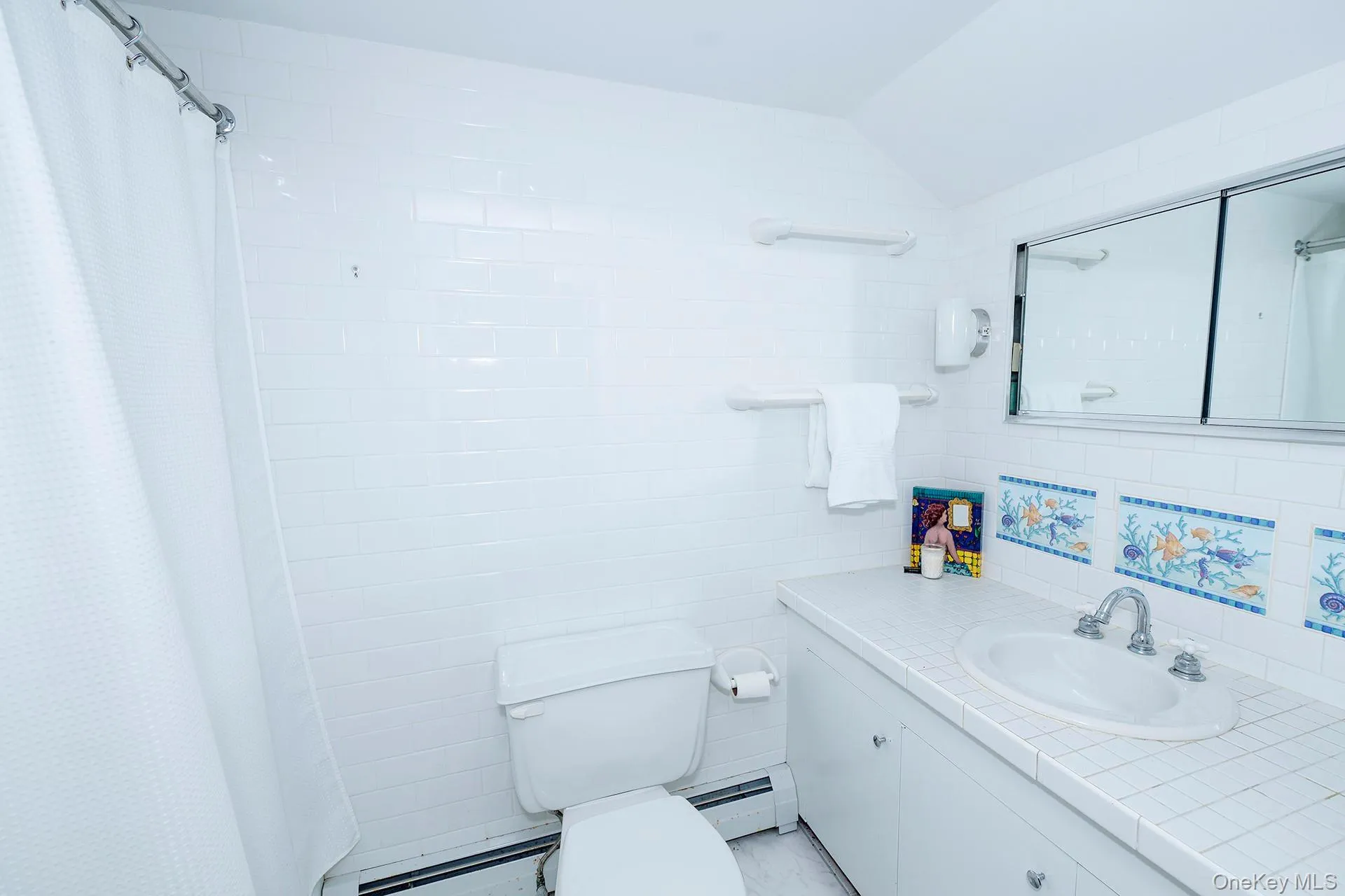 Full bathroom off hallway Full bathroom off hallway