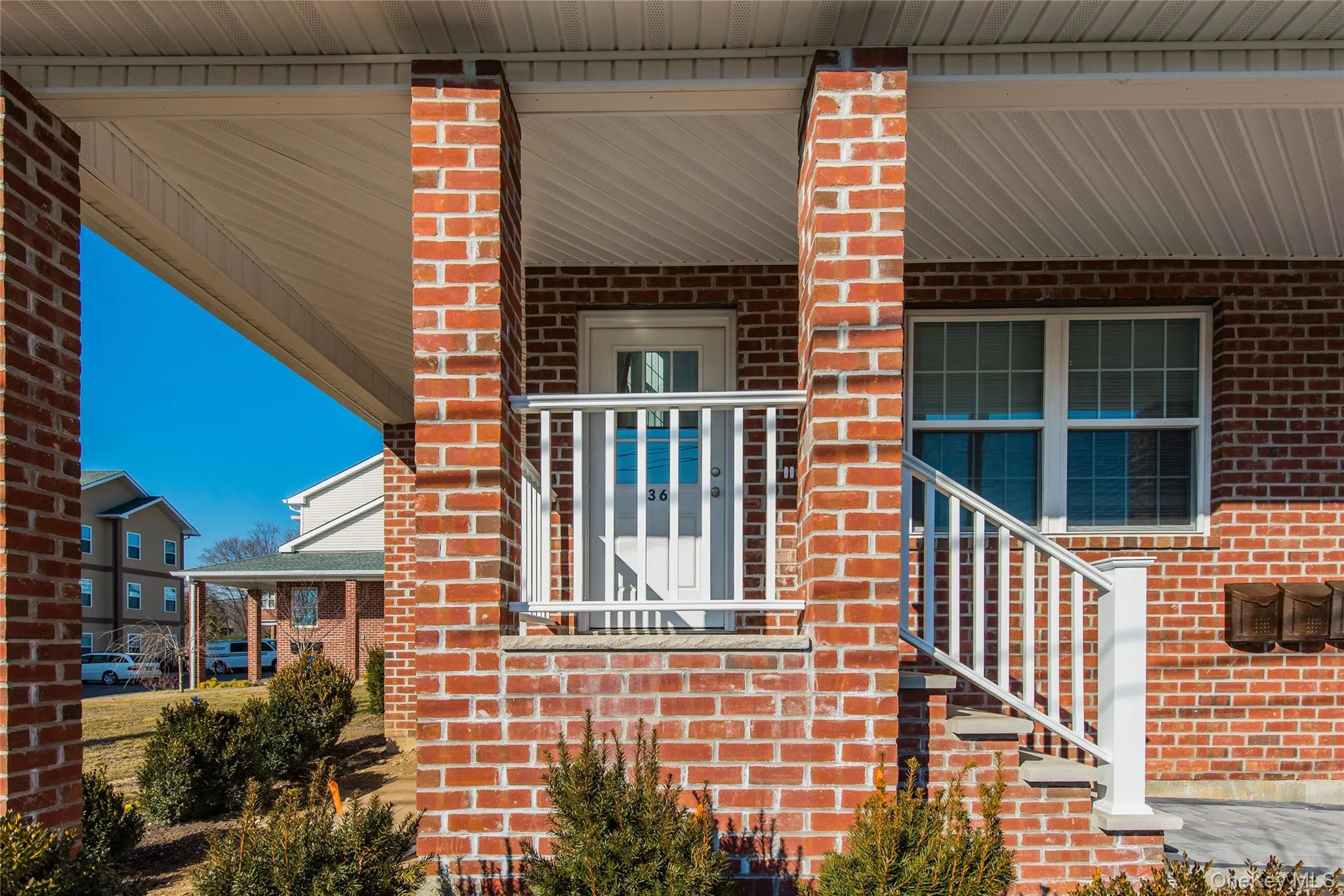 Entrance to property featuring brick siding Entrance to property featuring brick siding