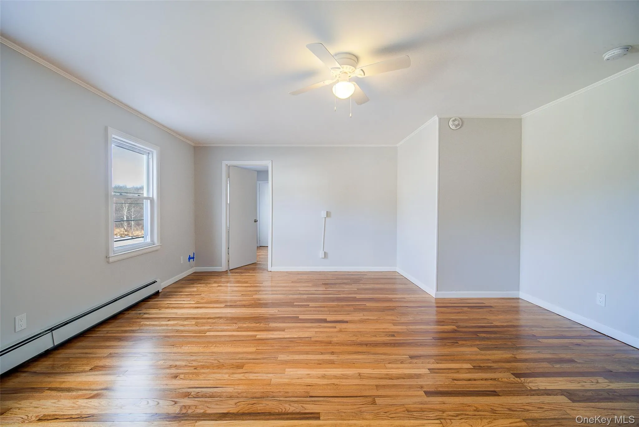 Another view of the living room with view to one of the bedrooms. Another view of the living room with view to one of the bedrooms.