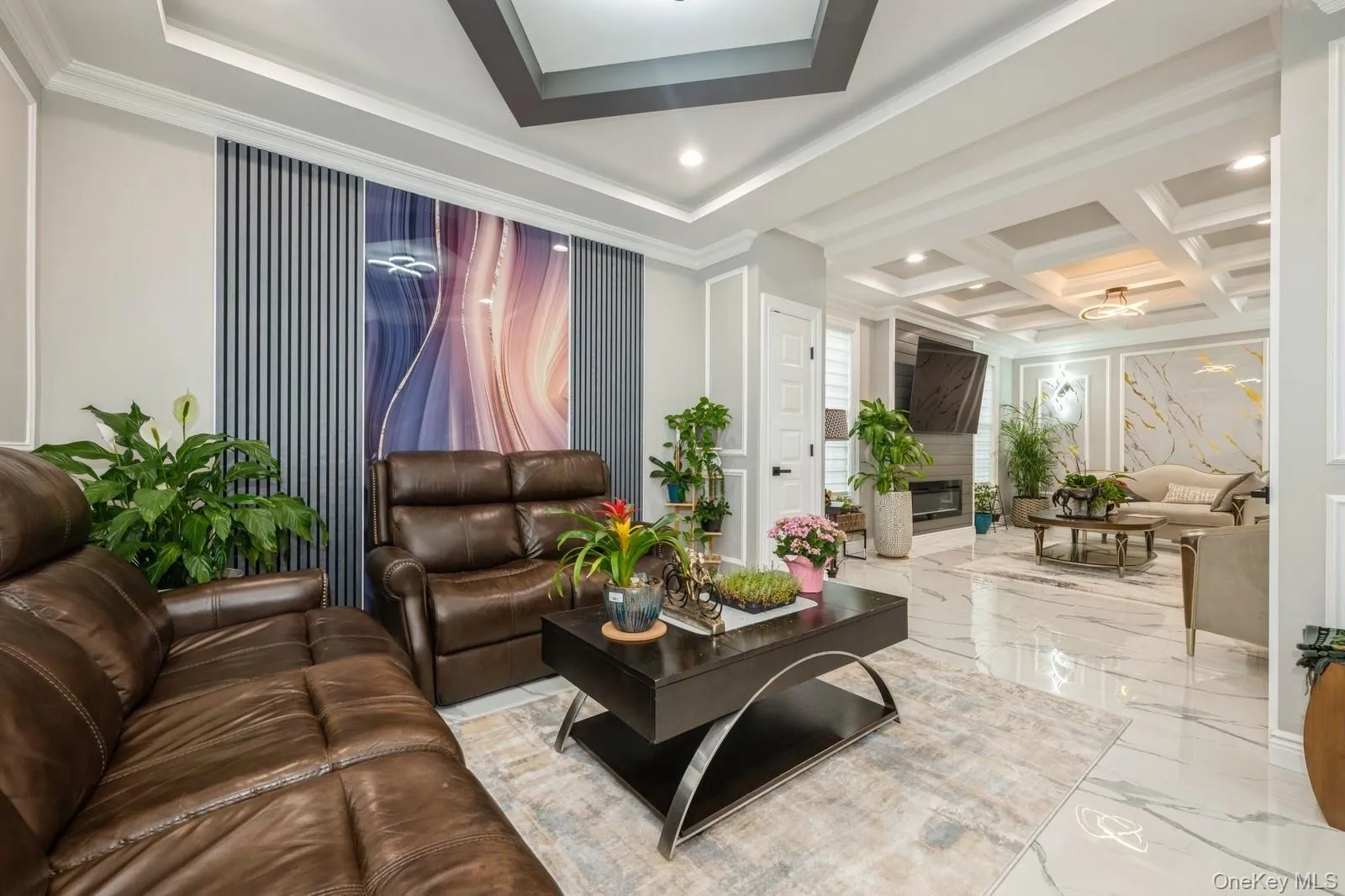 Common area featuring crown molding, recessed lighting, and coffered ceiling Common area featuring crown molding, recessed lighting, and coffered ceiling