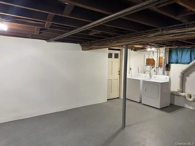 Unfinished basement with separate washer and dryer Unfinished basement with separate washer and dryer