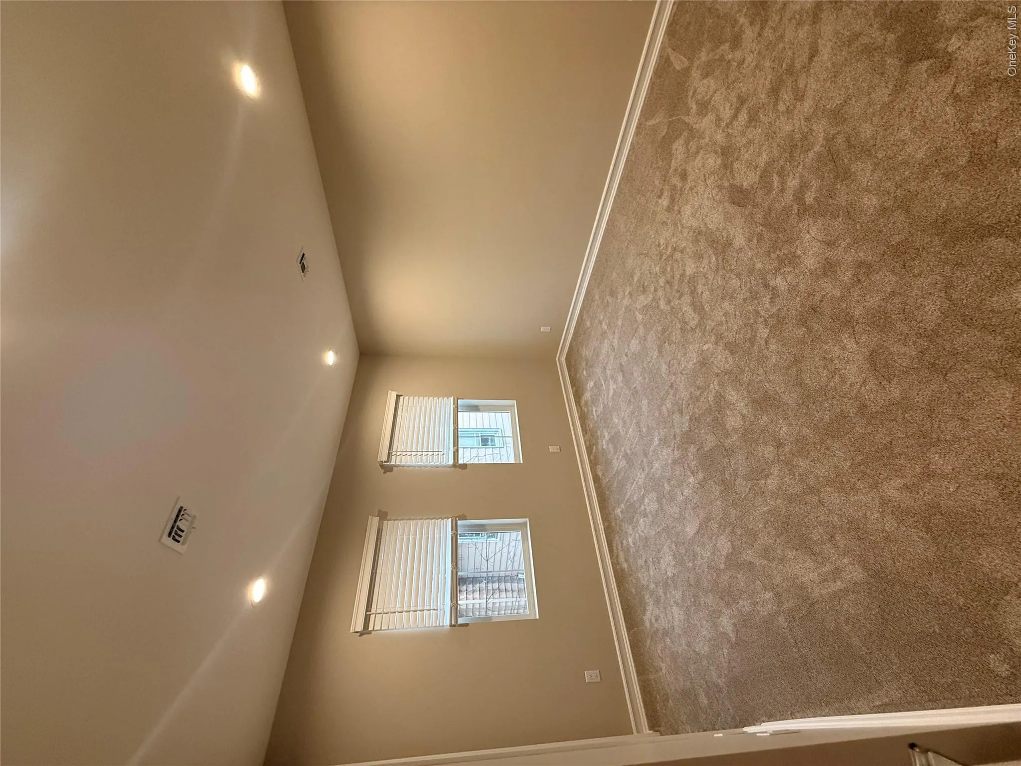Unfurnished room featuring recessed lighting and carpet Unfurnished room featuring recessed lighting and carpet
