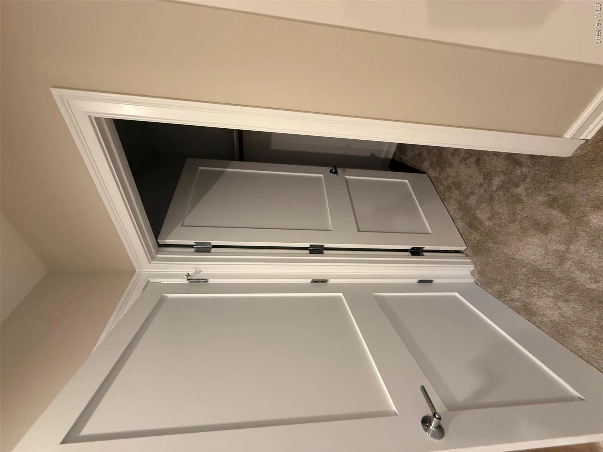 Corridor with dark colored carpet Corridor with dark colored carpet