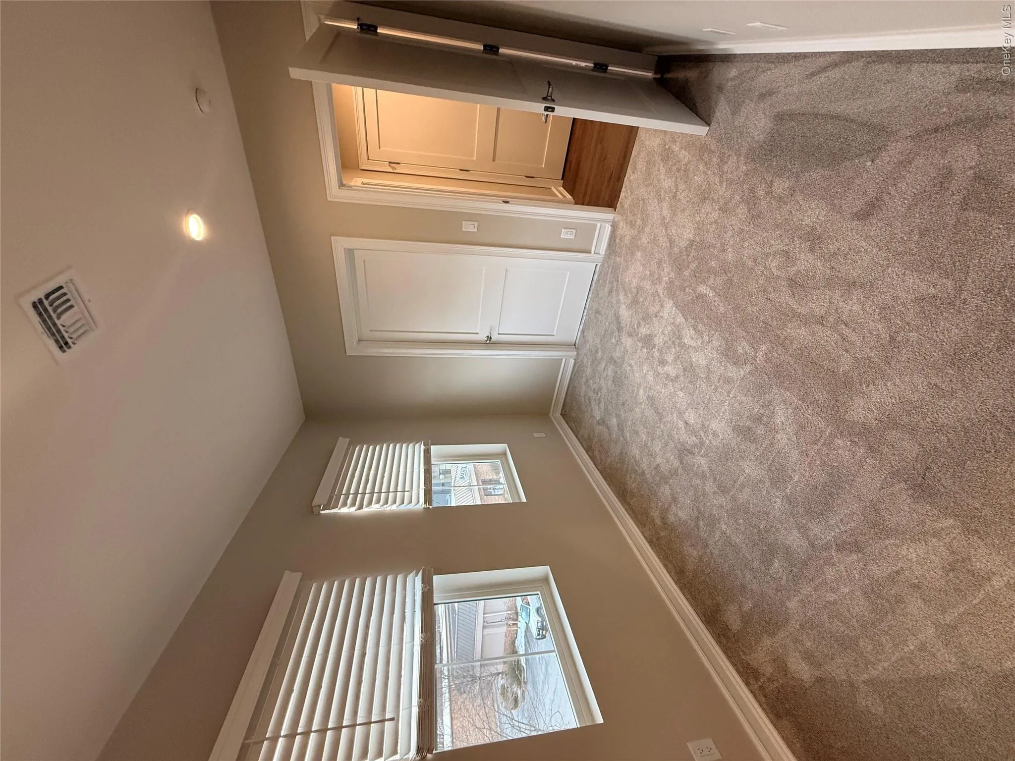 Unfurnished bedroom with carpet and recessed lighting Unfurnished bedroom with carpet and recessed lighting