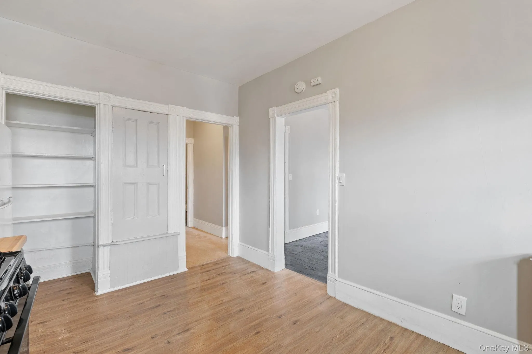 Unfurnished bedroom with wood finished floors Unfurnished bedroom with wood finished floors