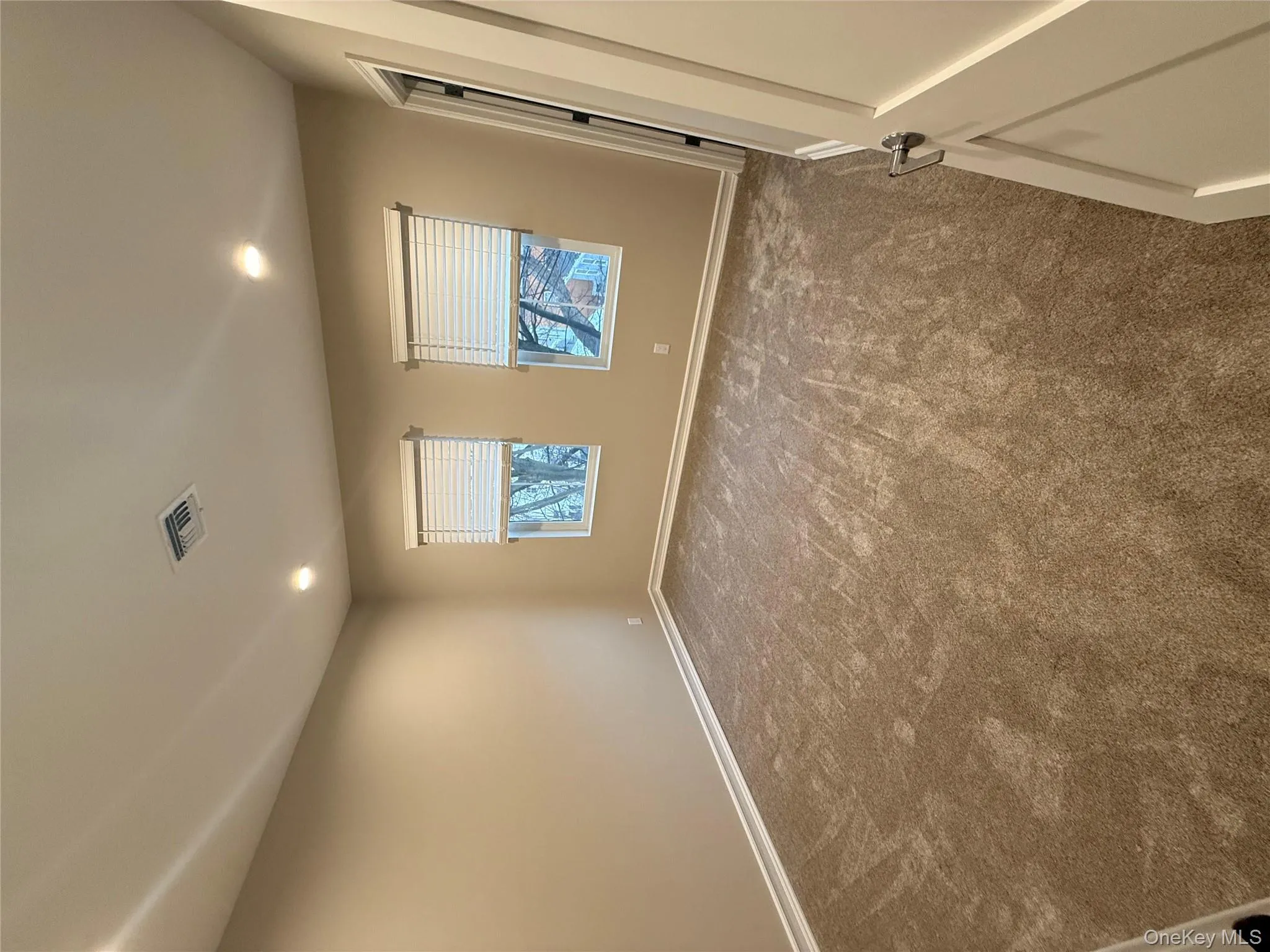Unfurnished room featuring recessed lighting and carpet Unfurnished room featuring recessed lighting and carpet