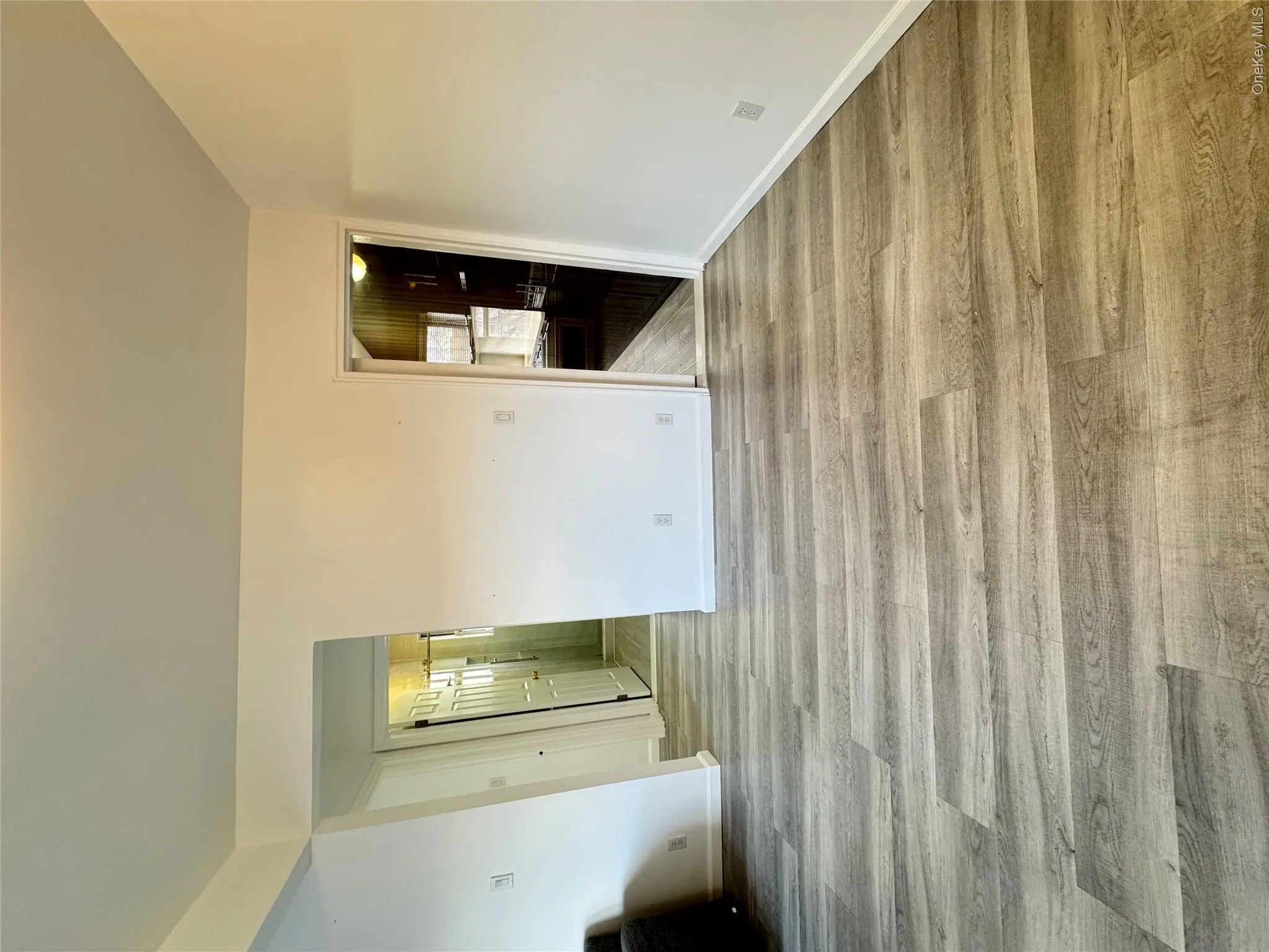 Unfurnished room with light wood-type flooring Unfurnished room with light wood-type flooring
