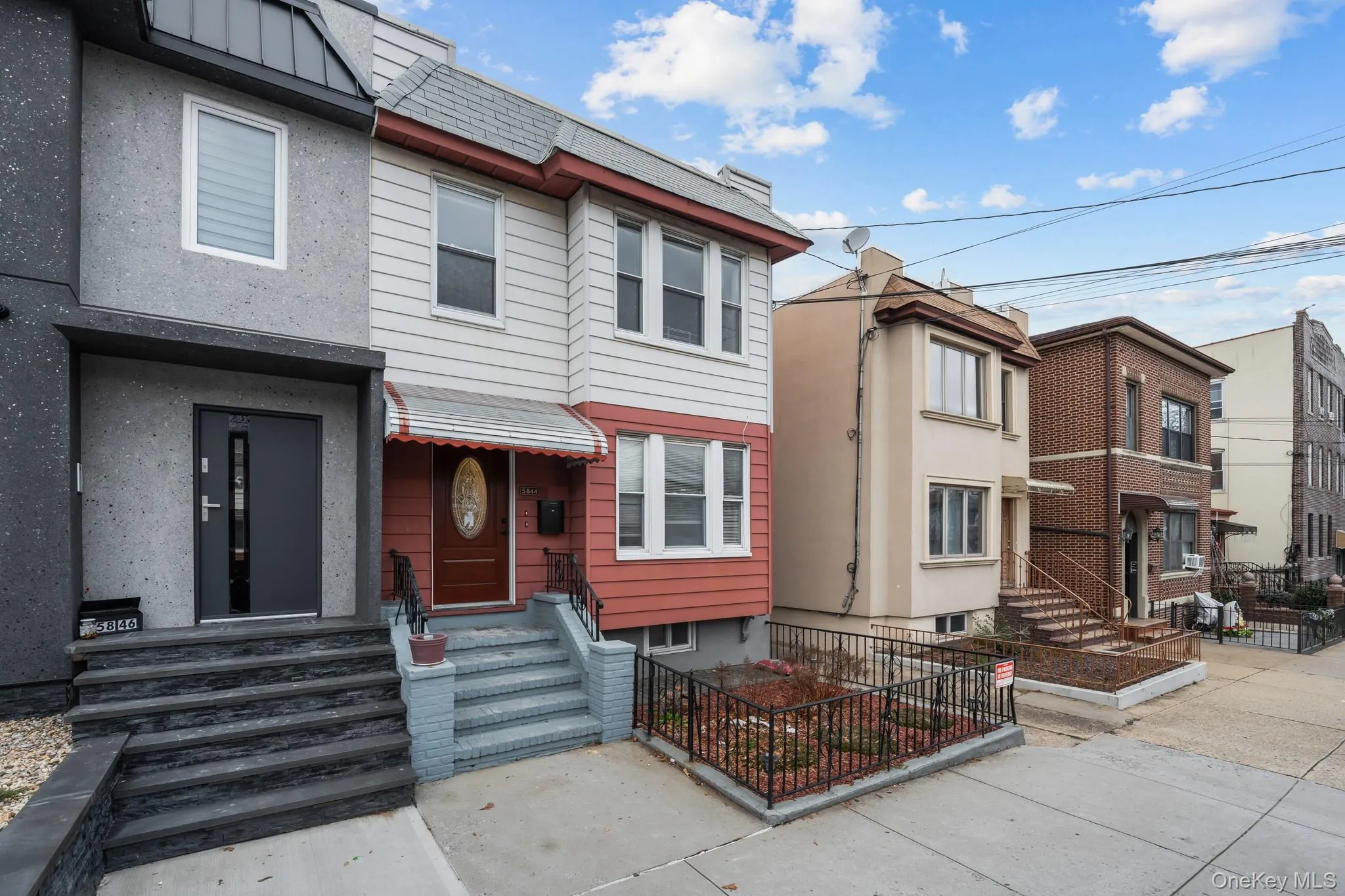 View of front facade with a residential view and stucco siding View of front facade with a residential view and stucco siding