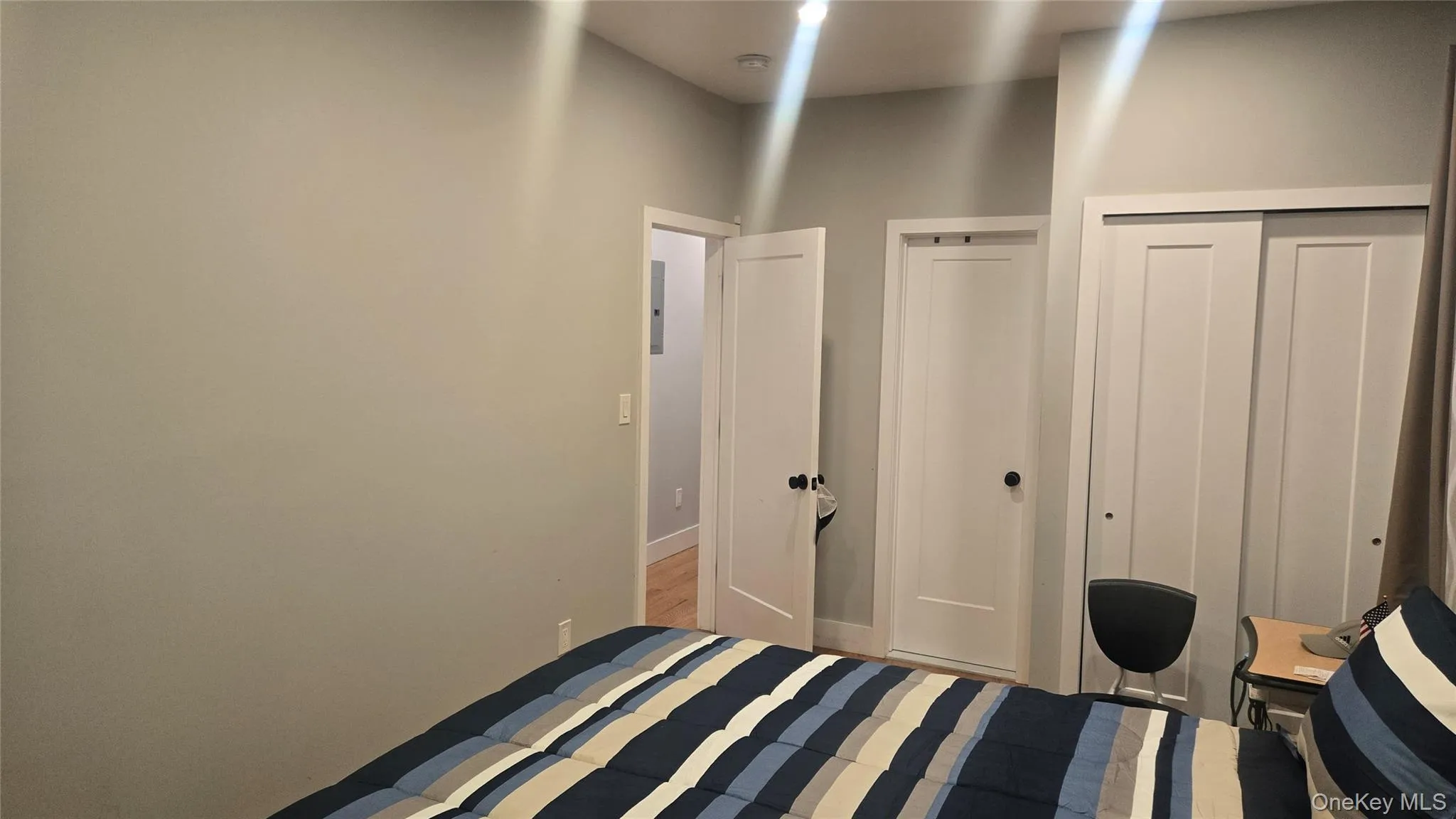 Bedroom featuring a closet Bedroom featuring a closet