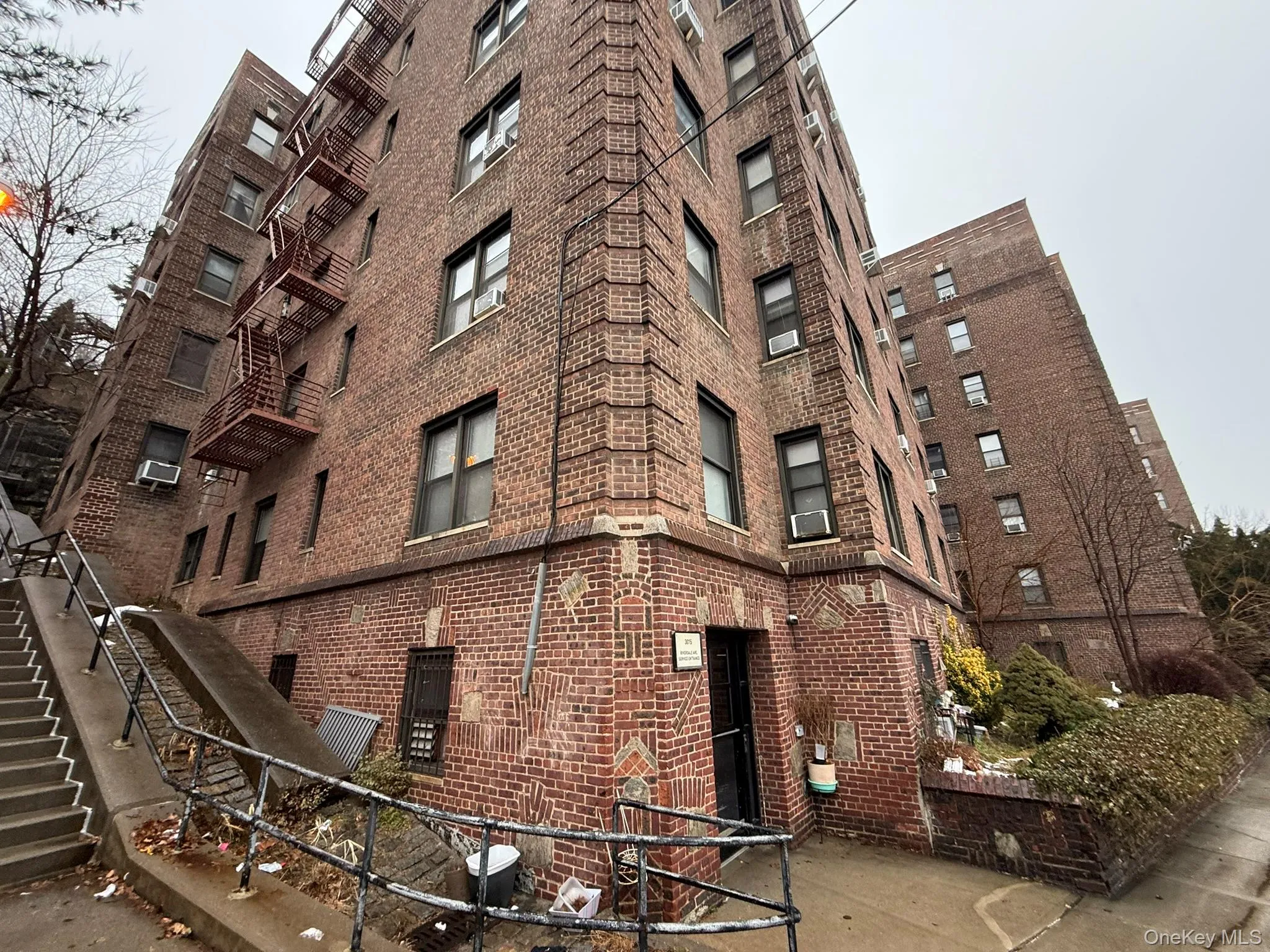 View of apartment building / complex with stairway View of apartment building / complex with stairway