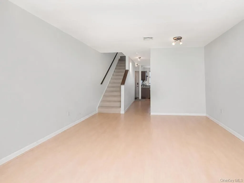 ** Virtually Cleared** Unfurnished living room with recessed lighting ** Virtually Cleared** Unfurnished living room with recessed lighting