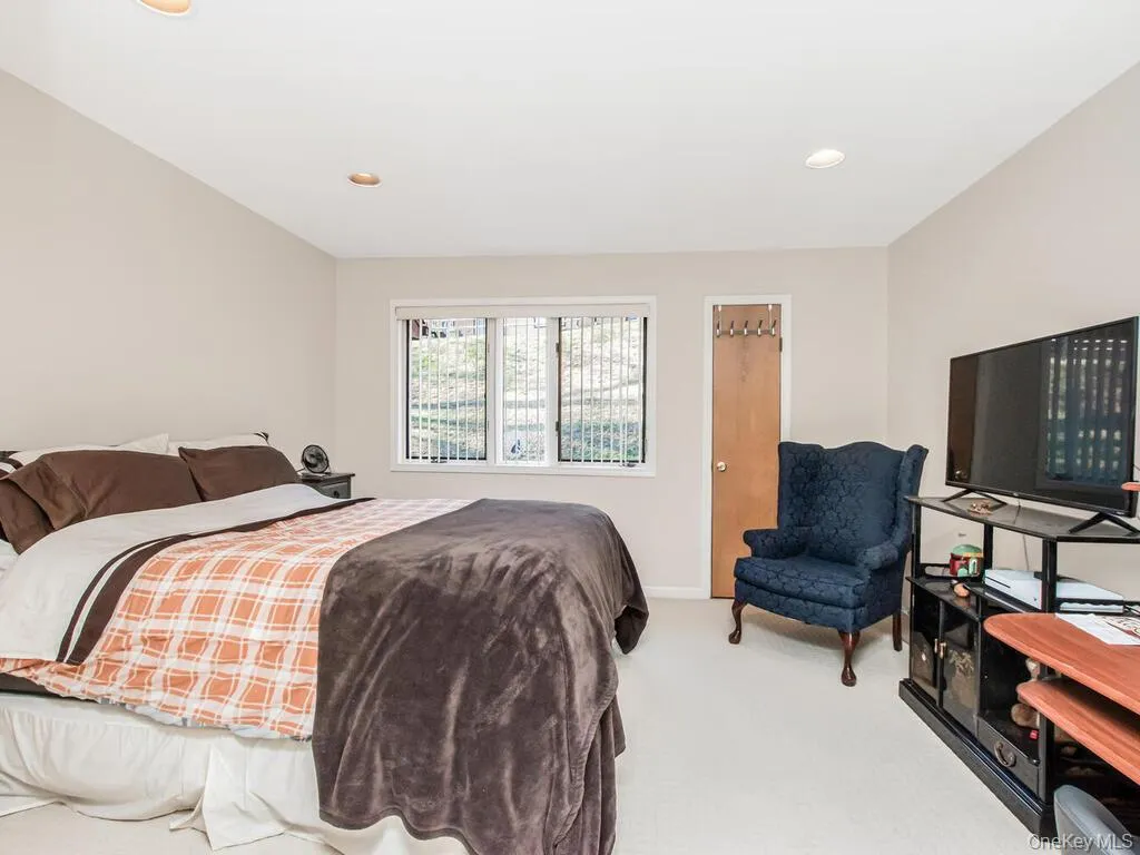 Carpeted bedroom featuring recessed lighting Carpeted bedroom featuring recessed lighting