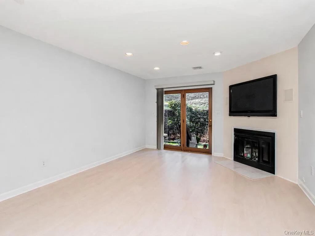 ** Virtually Cleared** Unfurnished living room with recessed lighting ** Virtually Cleared** Unfurnished living room with recessed lighting
