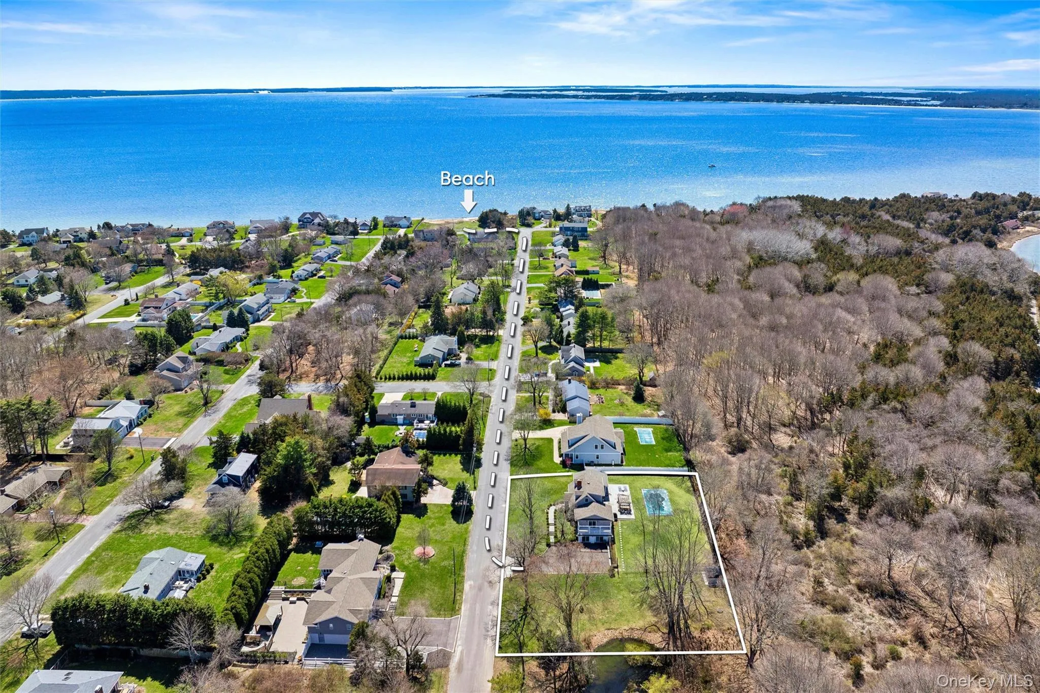 Drone / aerial view featuring a water view and a residential view Drone / aerial view featuring a water view and a residential view