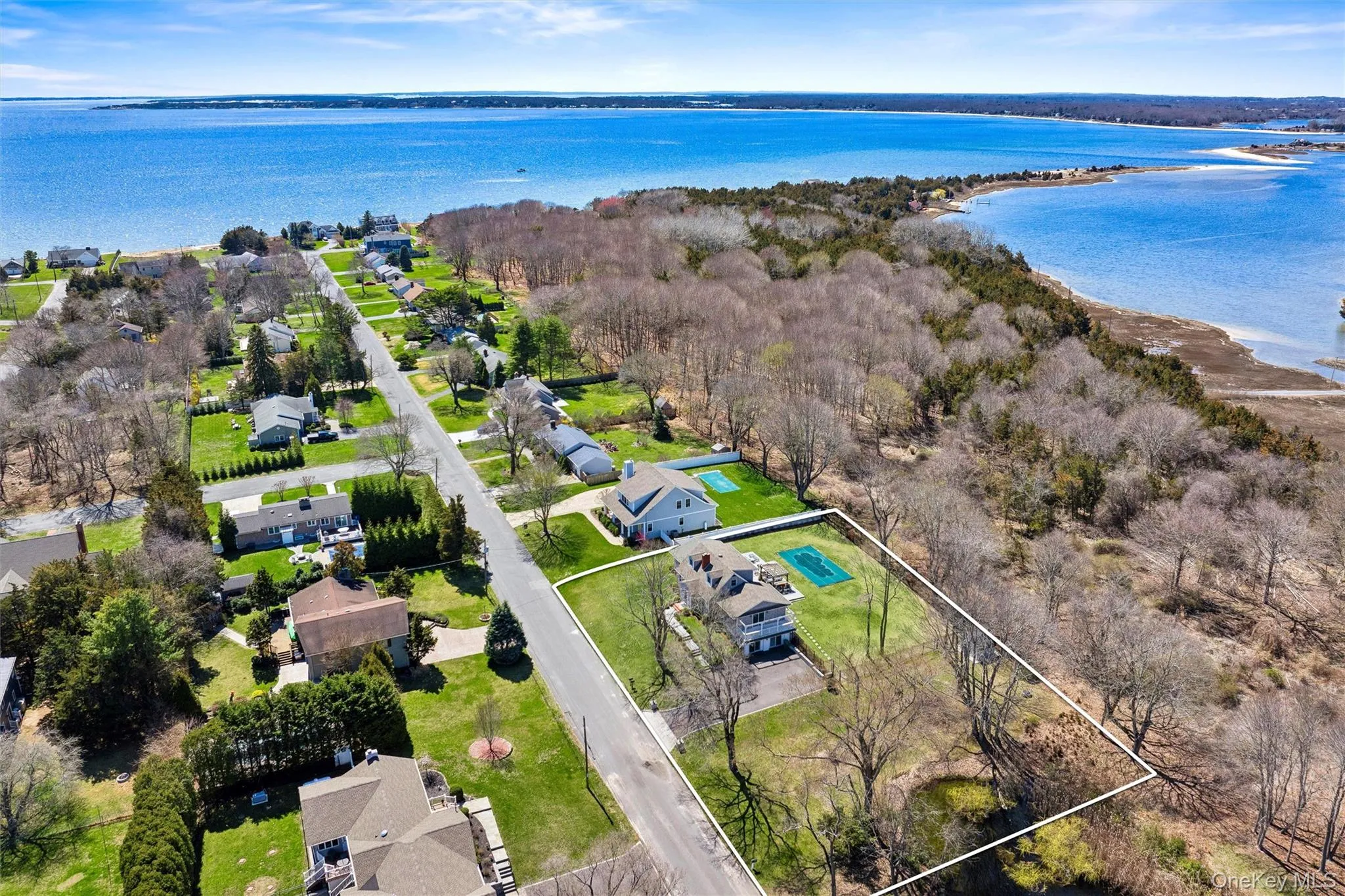 Bird's eye view featuring a water view and a residential view Bird's eye view featuring a water view and a residential view