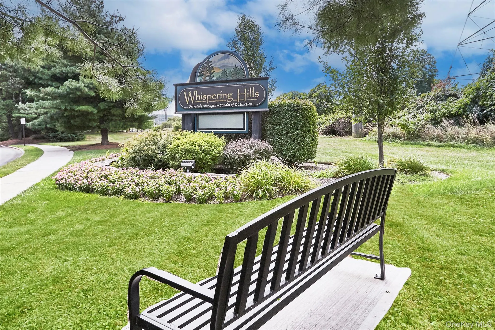 View of home's community featuring a lawn View of home's community featuring a lawn