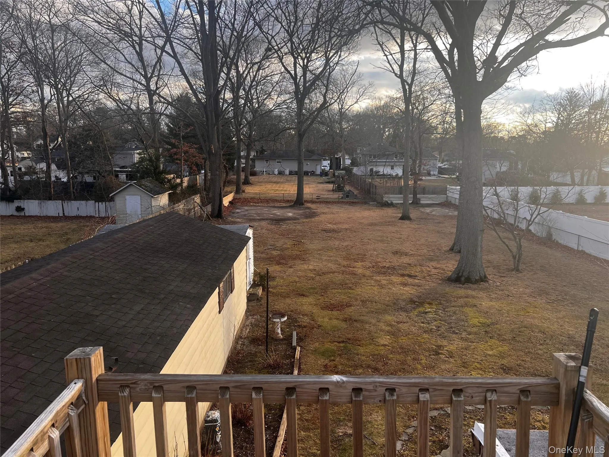 View of yard with a storage unit View of yard with a storage unit
