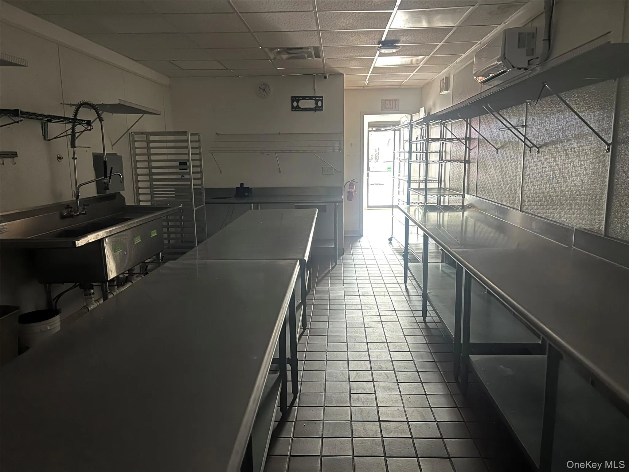 Kitchen featuring a paneled ceiling Kitchen featuring a paneled ceiling