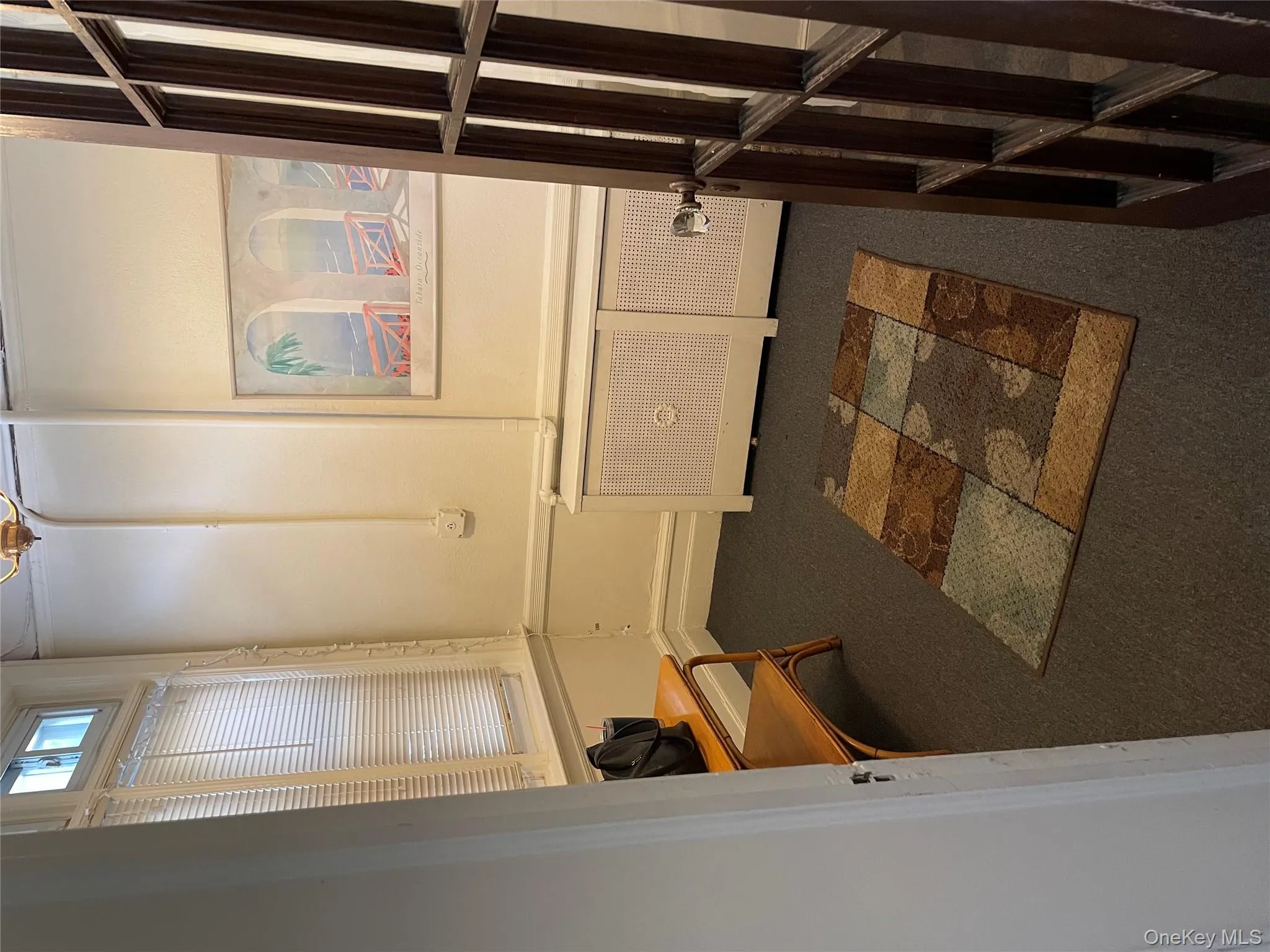 Spacious closet with dark carpet Spacious closet with dark carpet