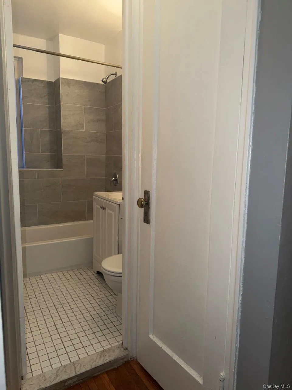 Full bathroom with washtub / shower combination and vanity Full bathroom with washtub / shower combination and vanity