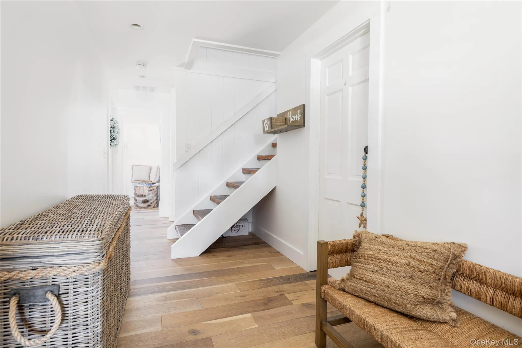 Stairway with hardwood / wood-style flooring and baseboards Stairway with hardwood / wood-style flooring and baseboards