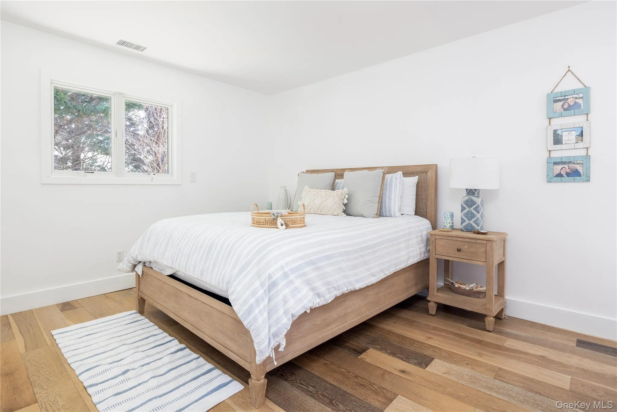 Bedroom featuring light wood-style flooring Bedroom featuring light wood-style flooring
