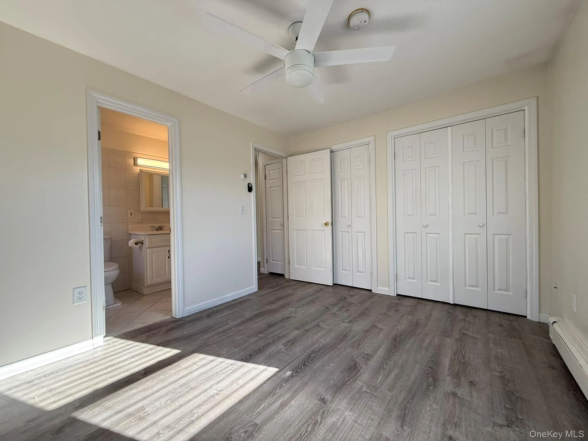 with door to bathroom with door to bathroom