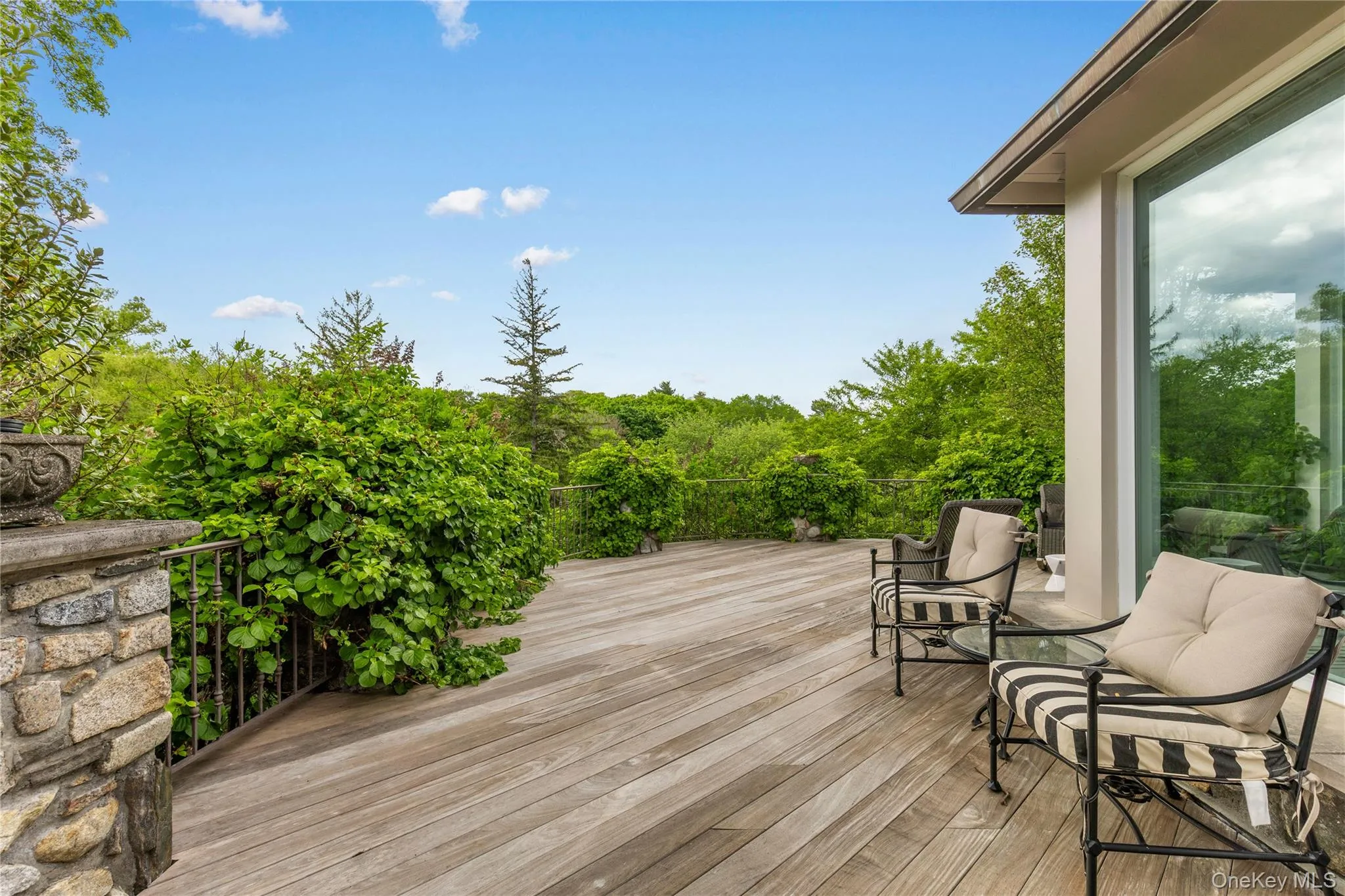 This lovely deck opens from the bar area and has open views of the property and beyond. This lovely deck opens from the bar area and has open views of the property and beyond.
