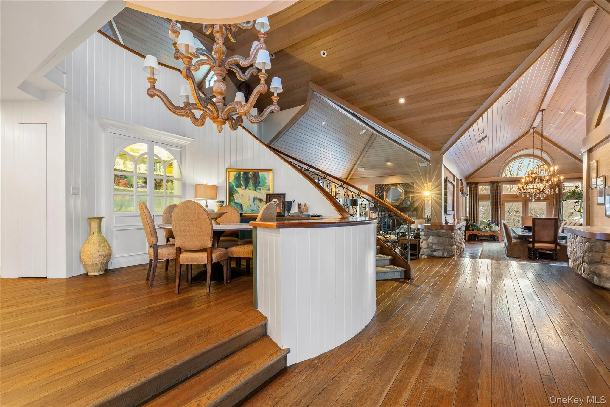 The main level living areas are open with space to breathe. Soaring ceilings, gas fireplace and doors out from almost every room. The main level living areas are open with space to breathe. Soaring ceilings, gas fireplace and doors out from almost every room.