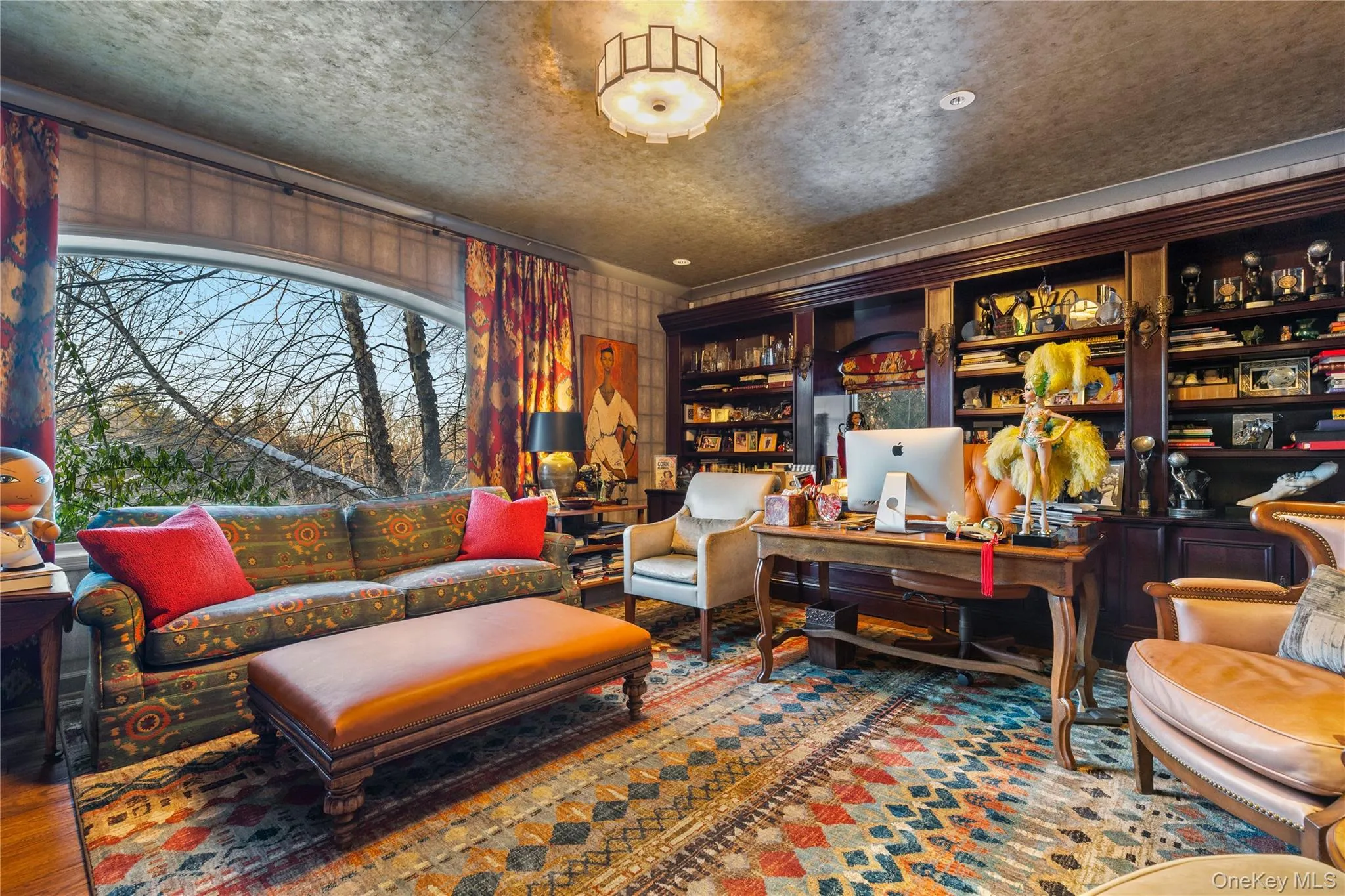 The main floor has a private office with a window overlooking the property. The main floor has a private office with a window overlooking the property.