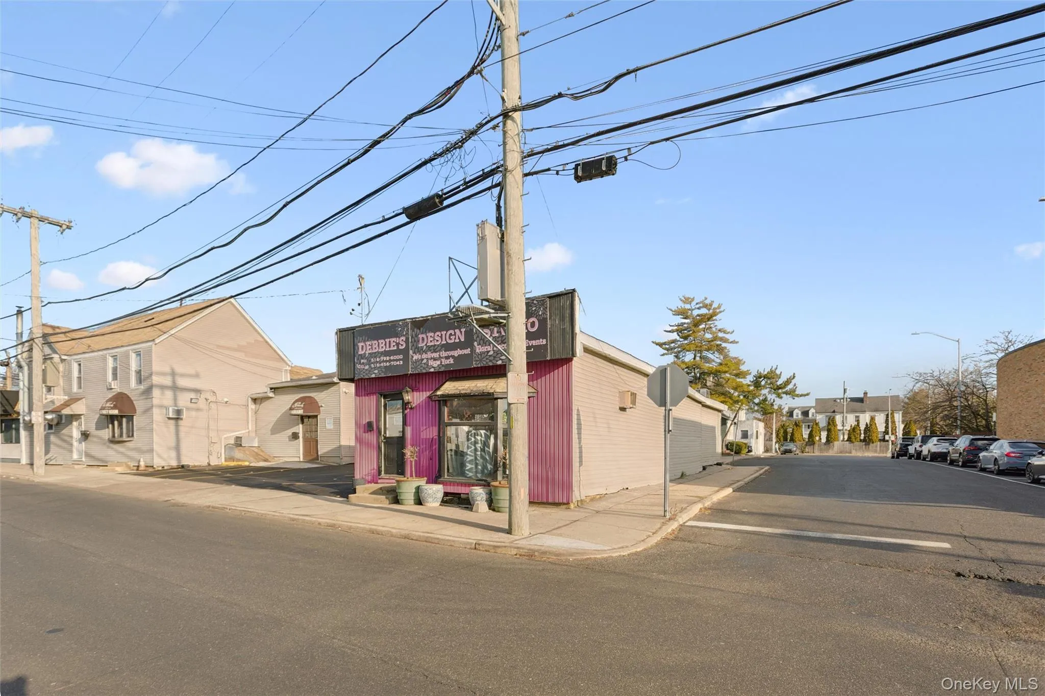 View of building exterior featuring a residential view View of building exterior featuring a residential view