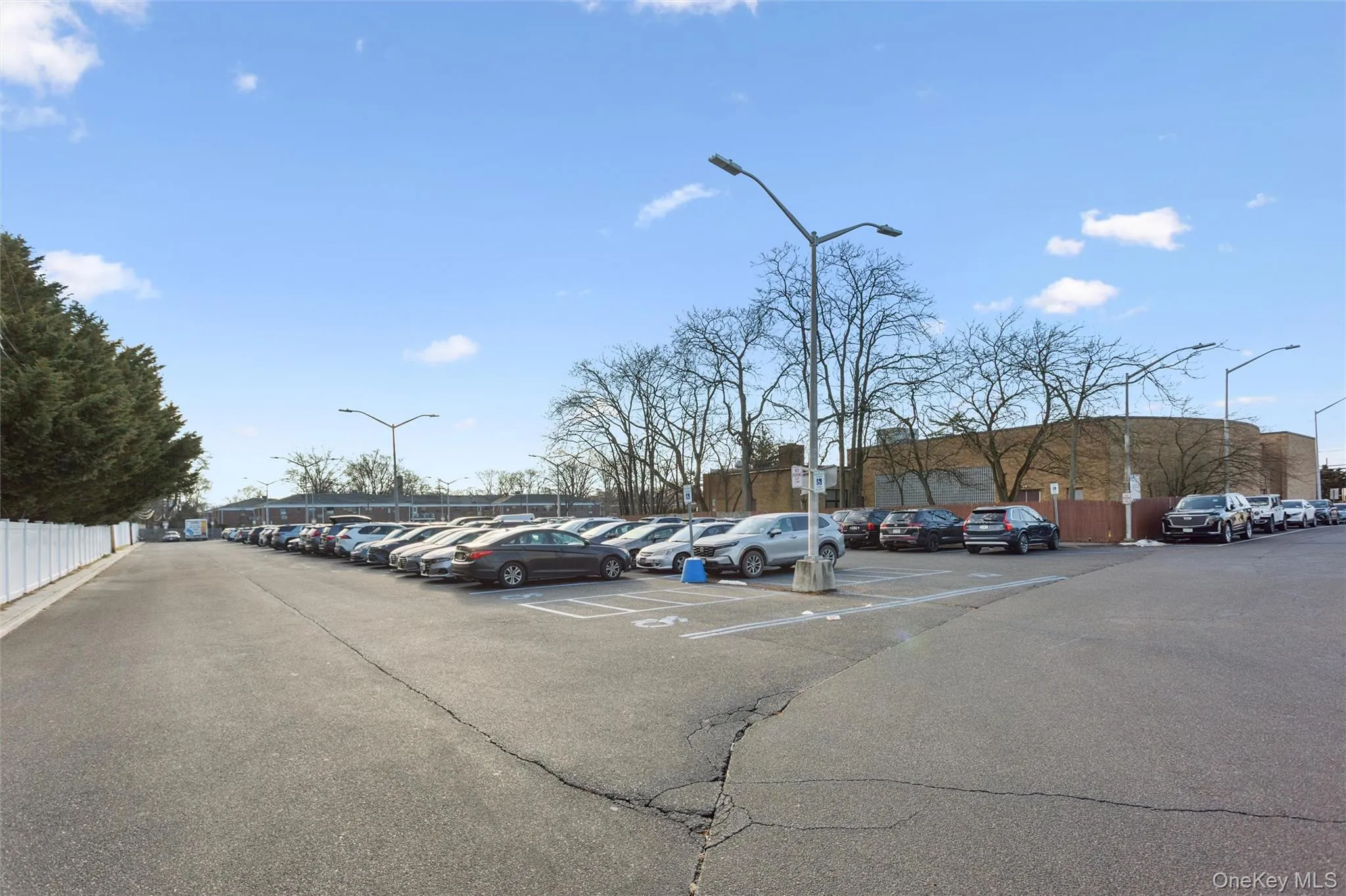 View of uncovered parking lot View of uncovered parking lot