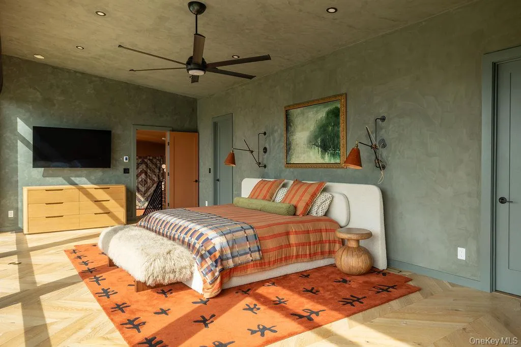 Bedroom with a ceiling fan and recessed lighting Bedroom with a ceiling fan and recessed lighting