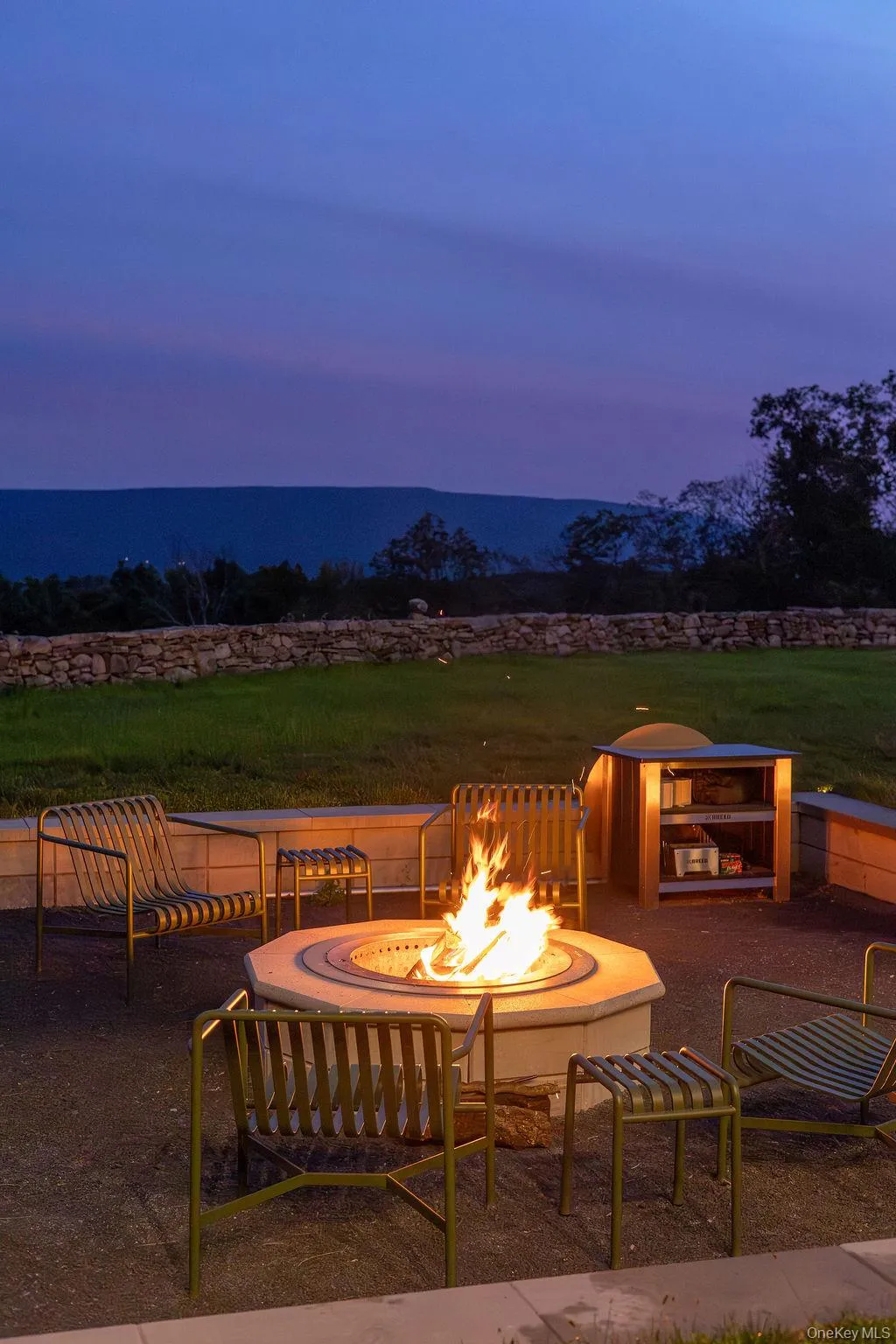 Patio terrace at dusk with a patio area Patio terrace at dusk with a patio area