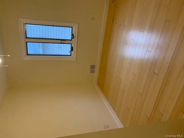 Empty room with light wood-style flooring Empty room with light wood-style flooring