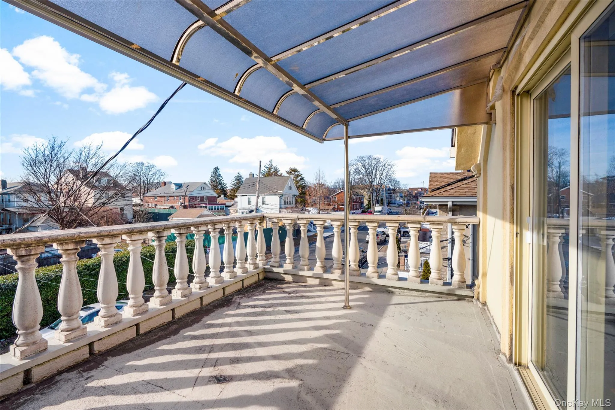 Balcony featuring a residential view Balcony featuring a residential view