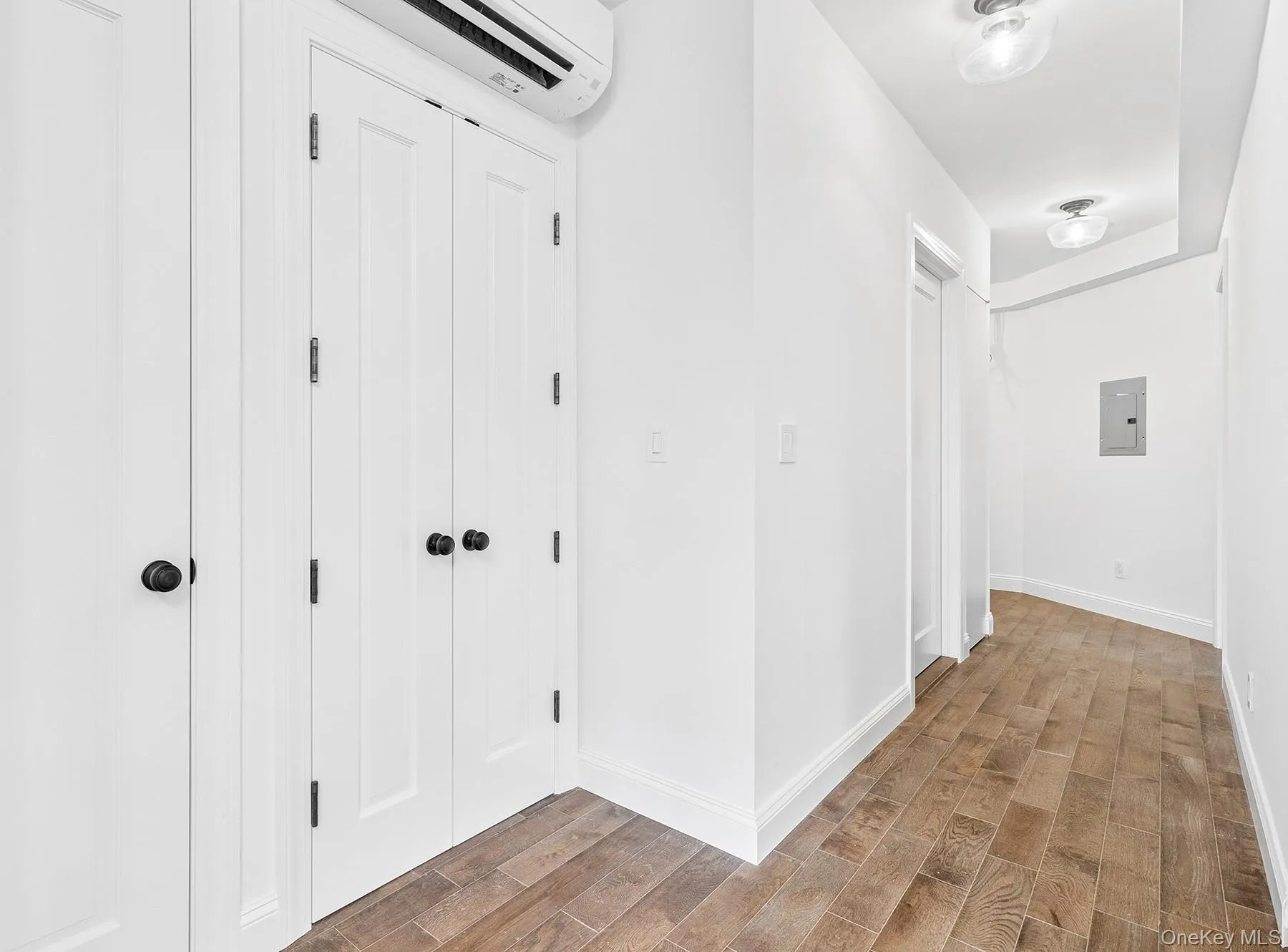 View of laundry and pantry area facing bathroom and main entrance View of laundry and pantry area facing bathroom and main entrance