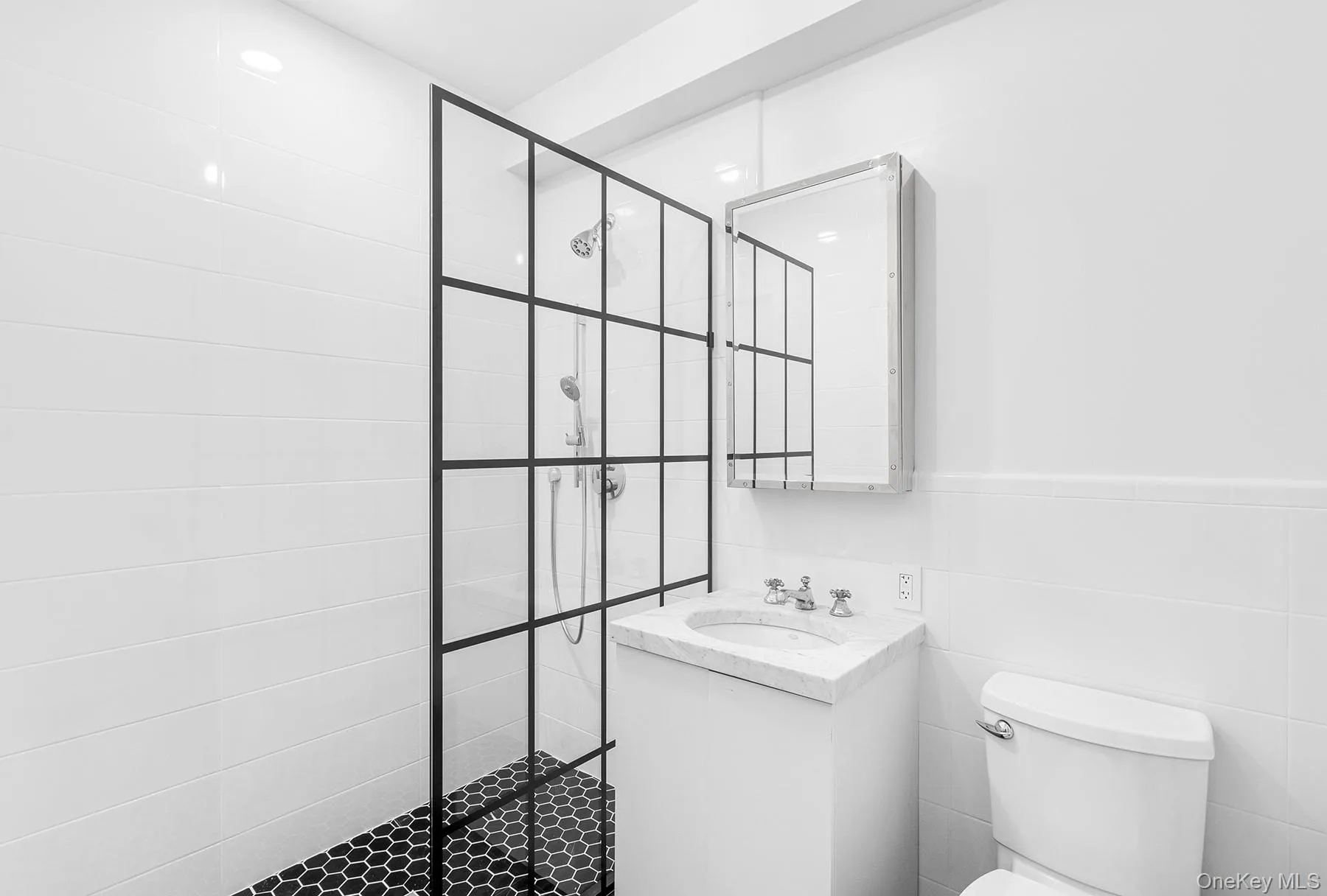 Updated Bathroom with Oversized Shower + glass panel Updated Bathroom with Oversized Shower + glass panel