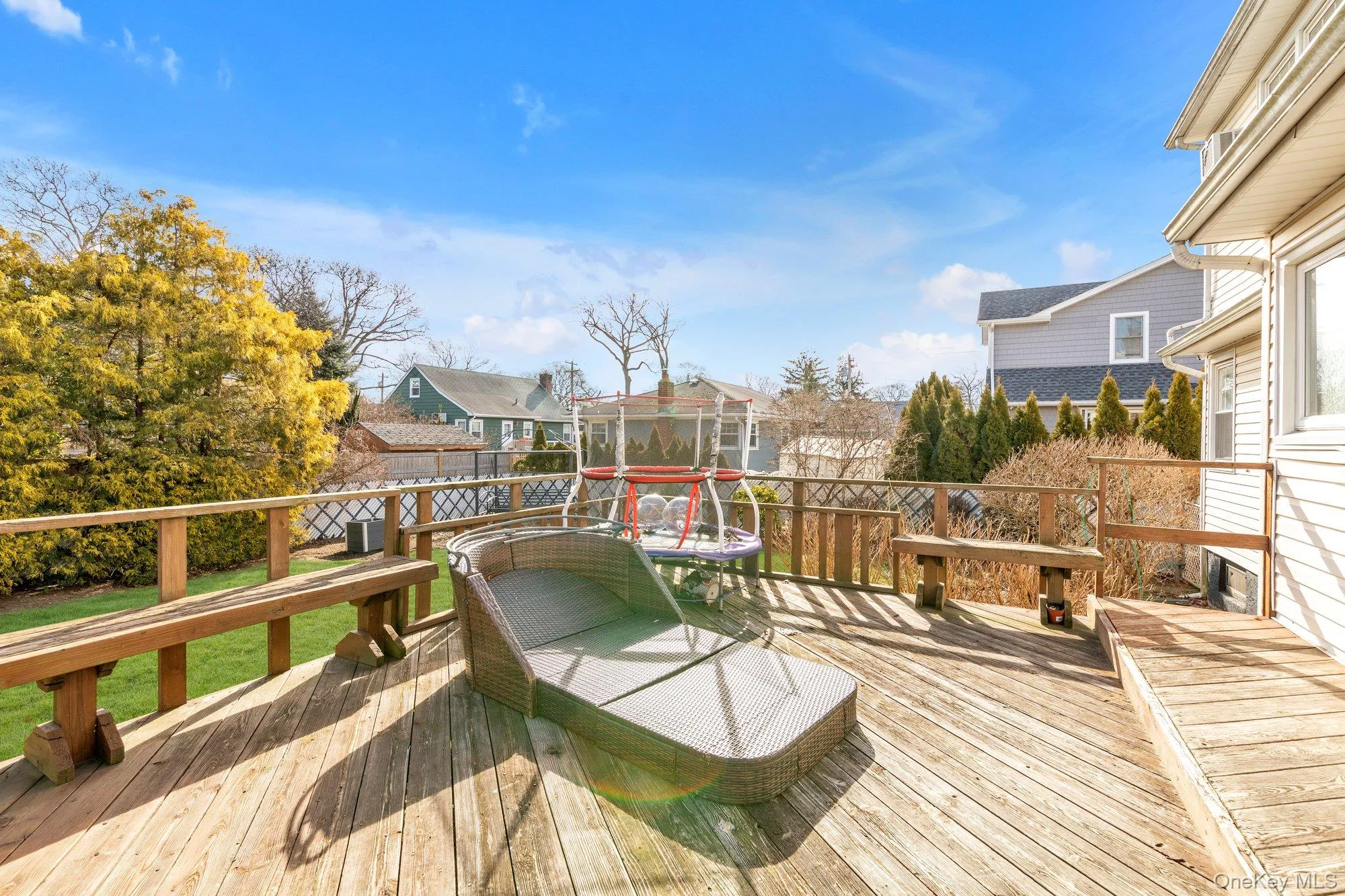 Wooden terrace with a residential view Wooden terrace with a residential view