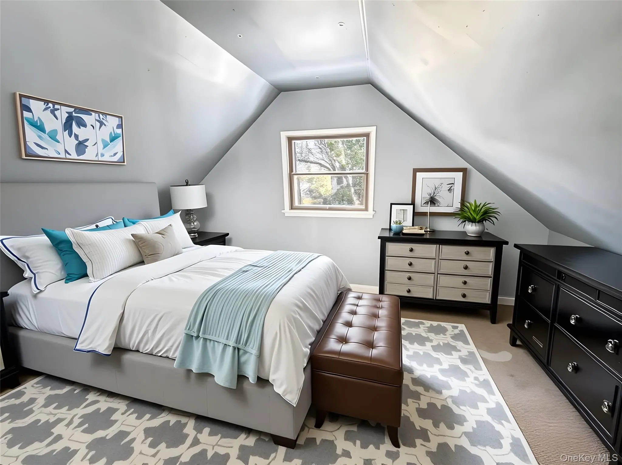 Bedroom with vaulted ceiling and light carpet Bedroom with vaulted ceiling and light carpet