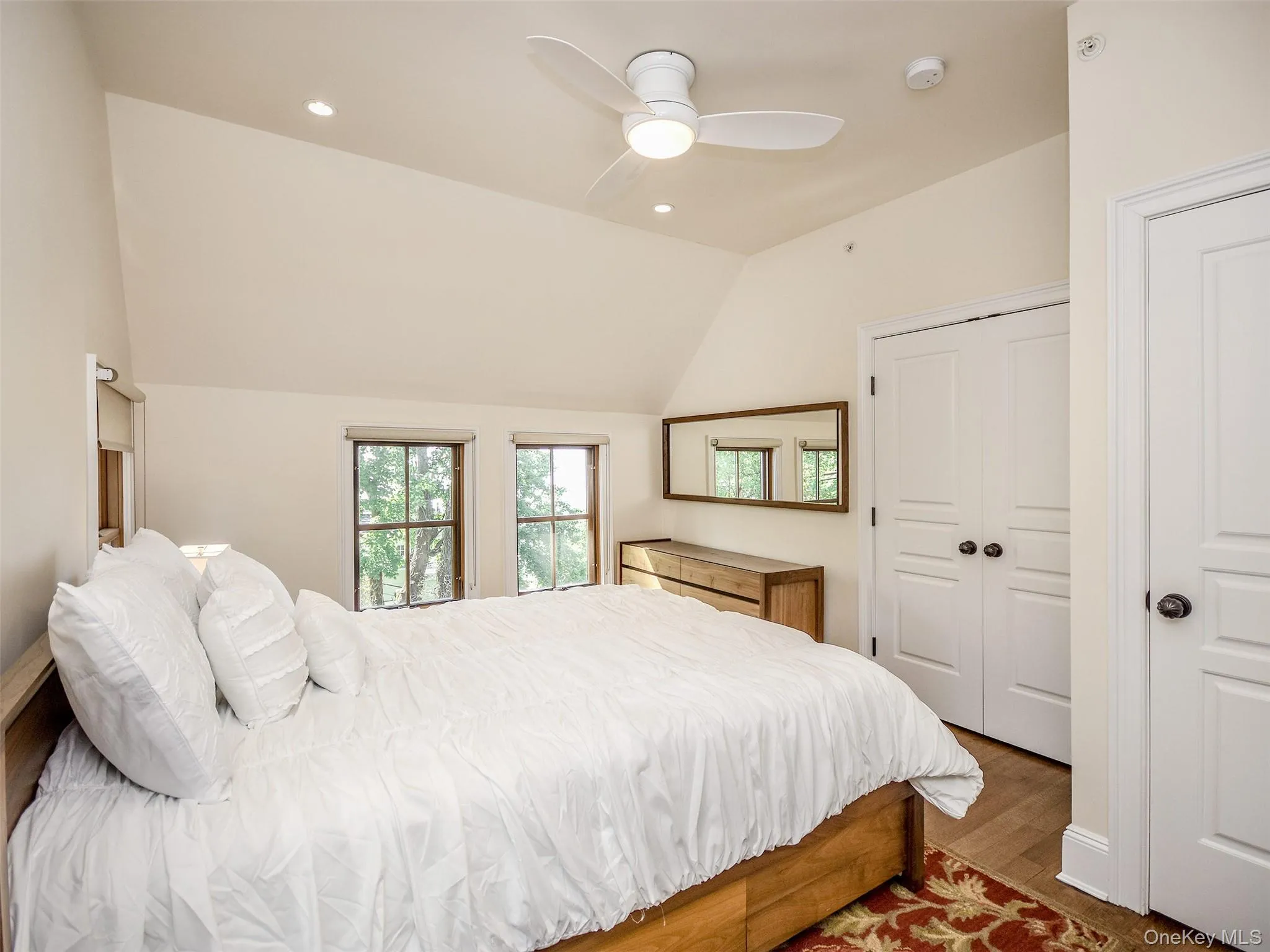 2nd. fl. Bedroom featuring recessed lighting, vaulted ceiling, ceiling fan, and wood finished floors 2nd. fl. Bedroom featuring recessed lighting, vaulted ceiling, ceiling fan, and wood finished floors
