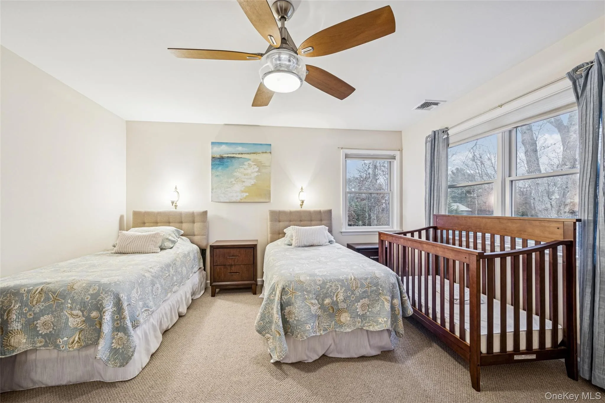 Carpeted bedroom with ceiling fan Carpeted bedroom with ceiling fan