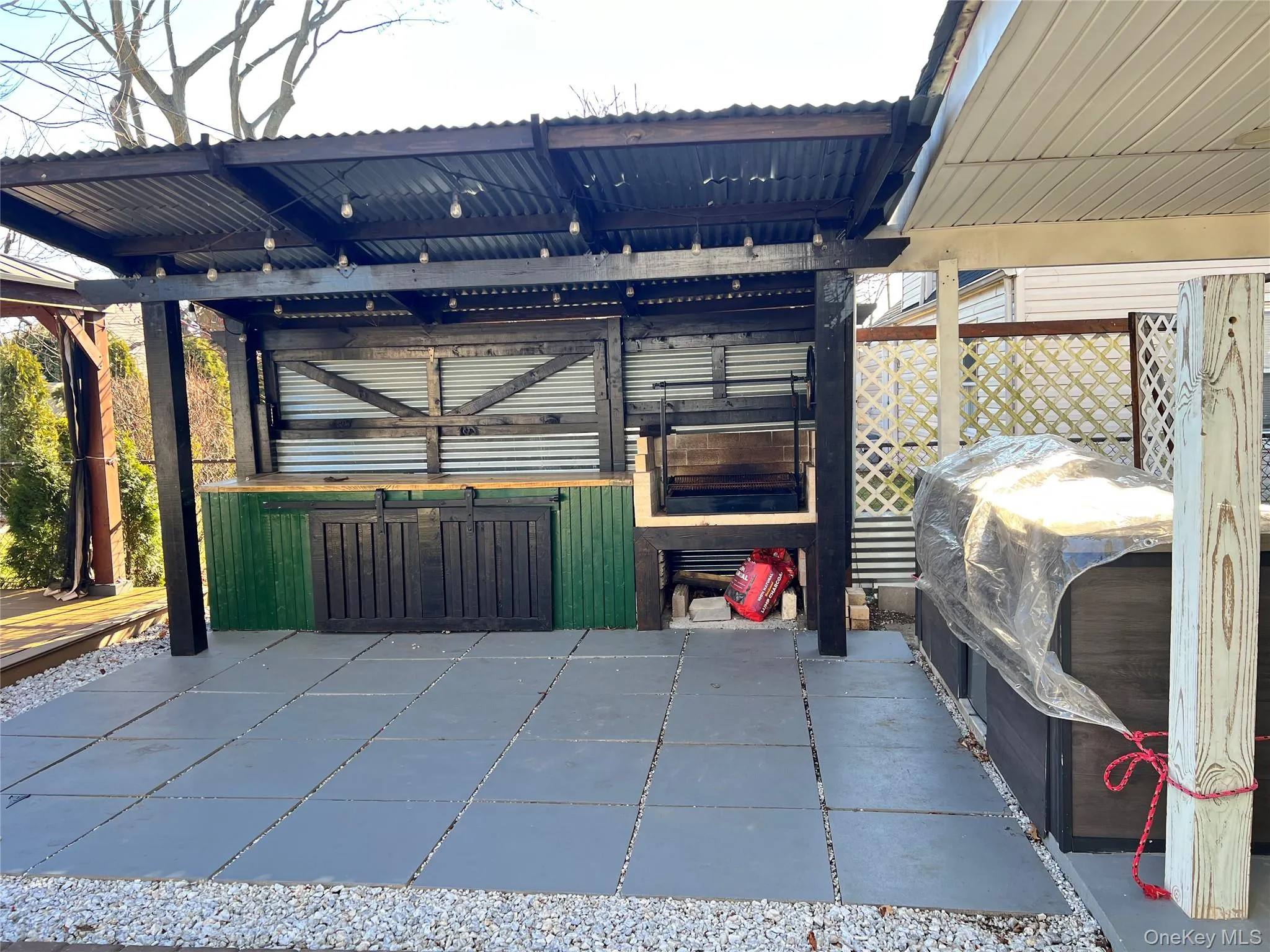 View of patio featuring a grill View of patio featuring a grill