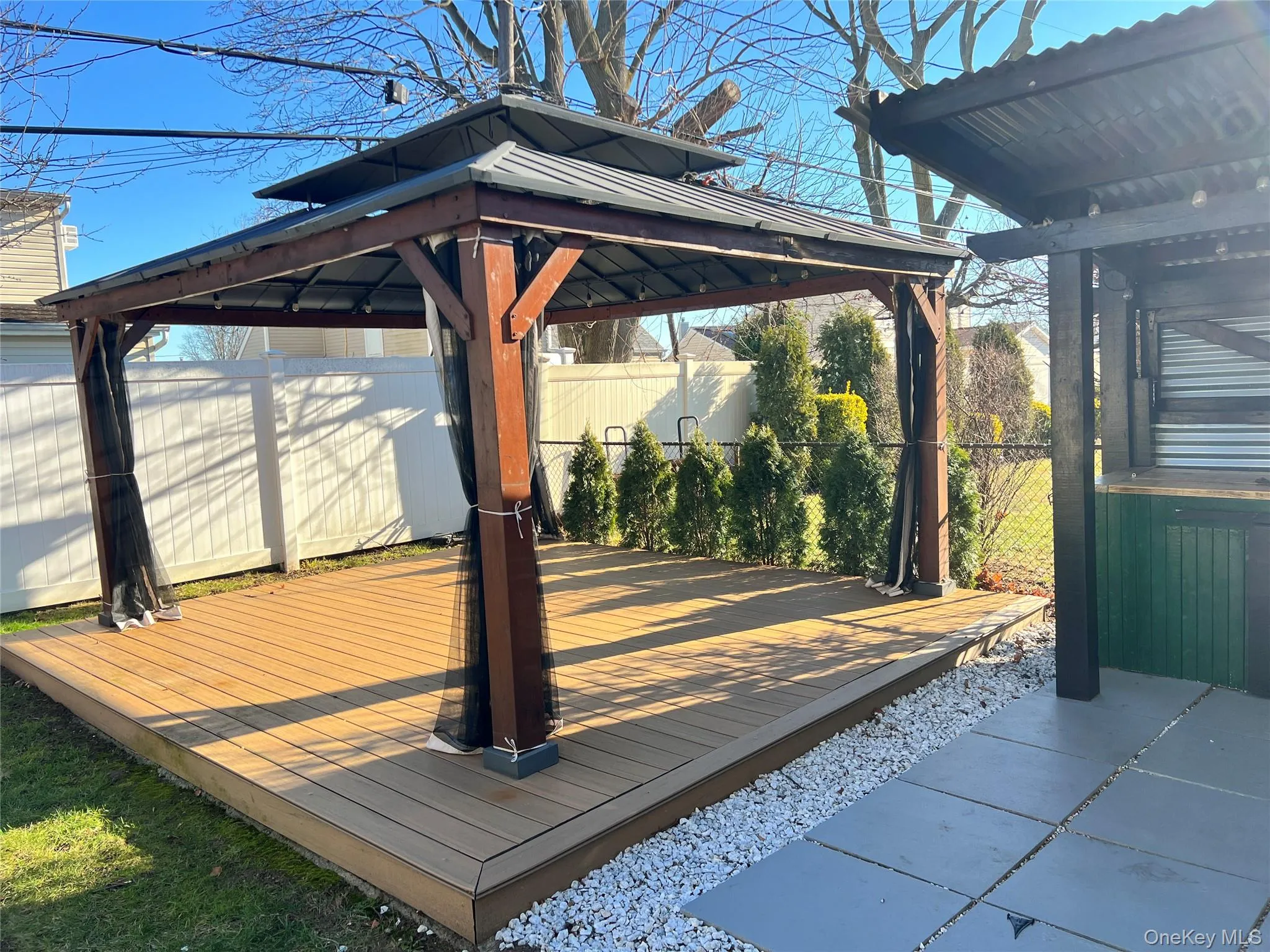 Wooden terrace with a gazebo Wooden terrace with a gazebo
