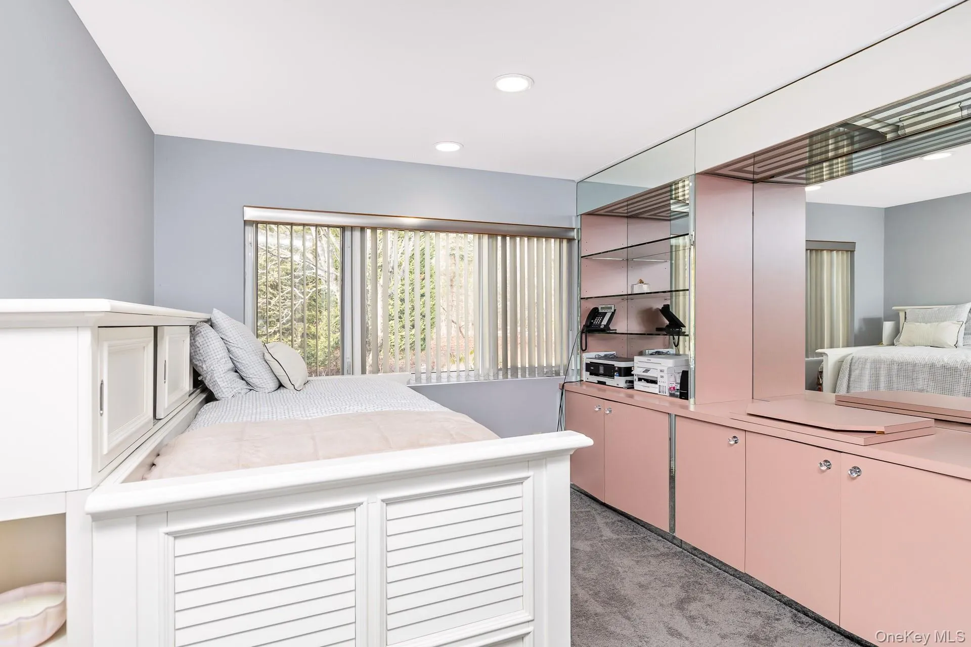 Bedroom featuring light carpet and recessed lighting Bedroom featuring light carpet and recessed lighting