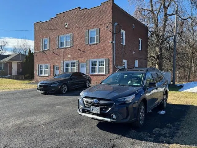 Front of the property with the parking area.... Front of the property with the parking area....
